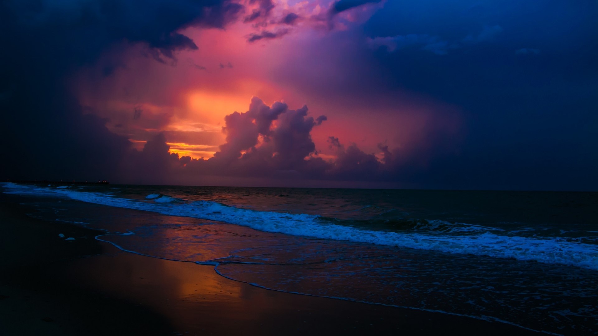 Sunset over the ocean with colorful clouds HD Wallpaper