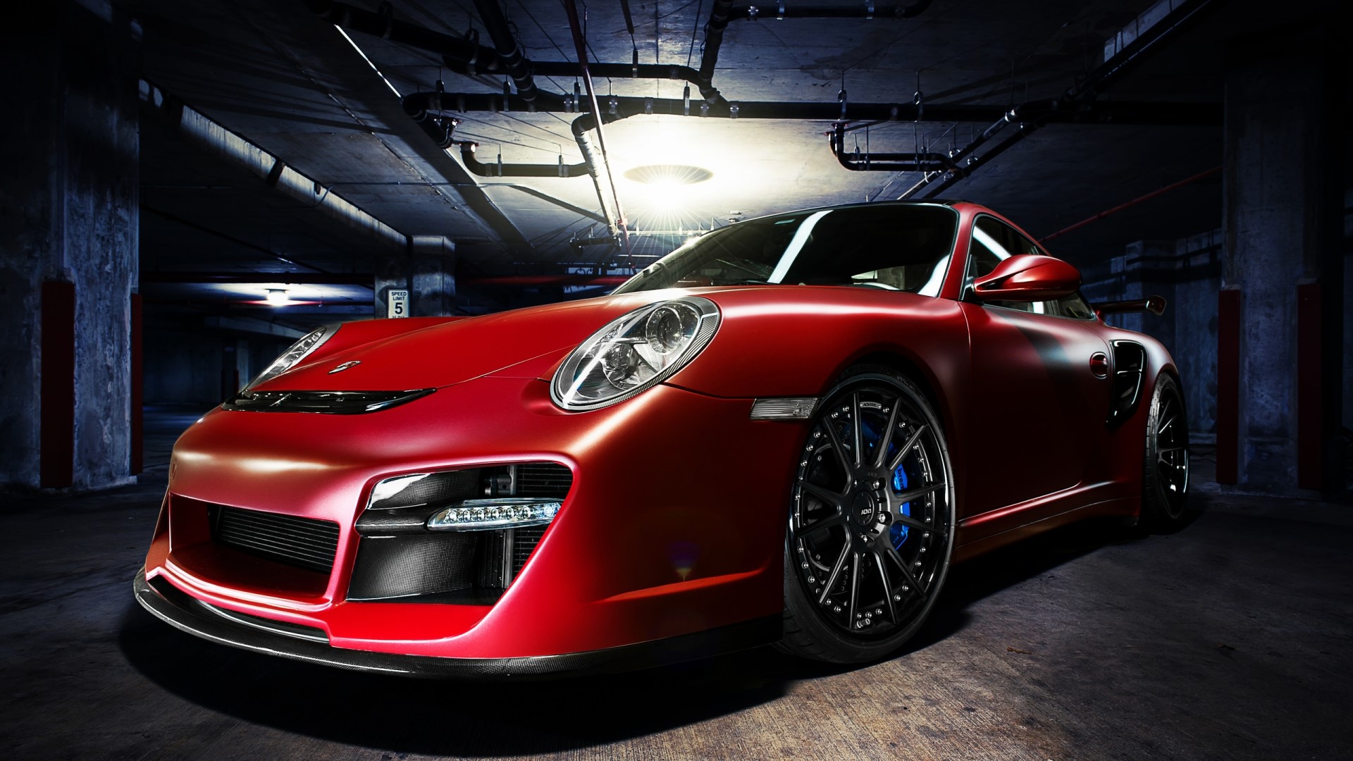 Red Porsche in a Parking Garage HD Wallpaper