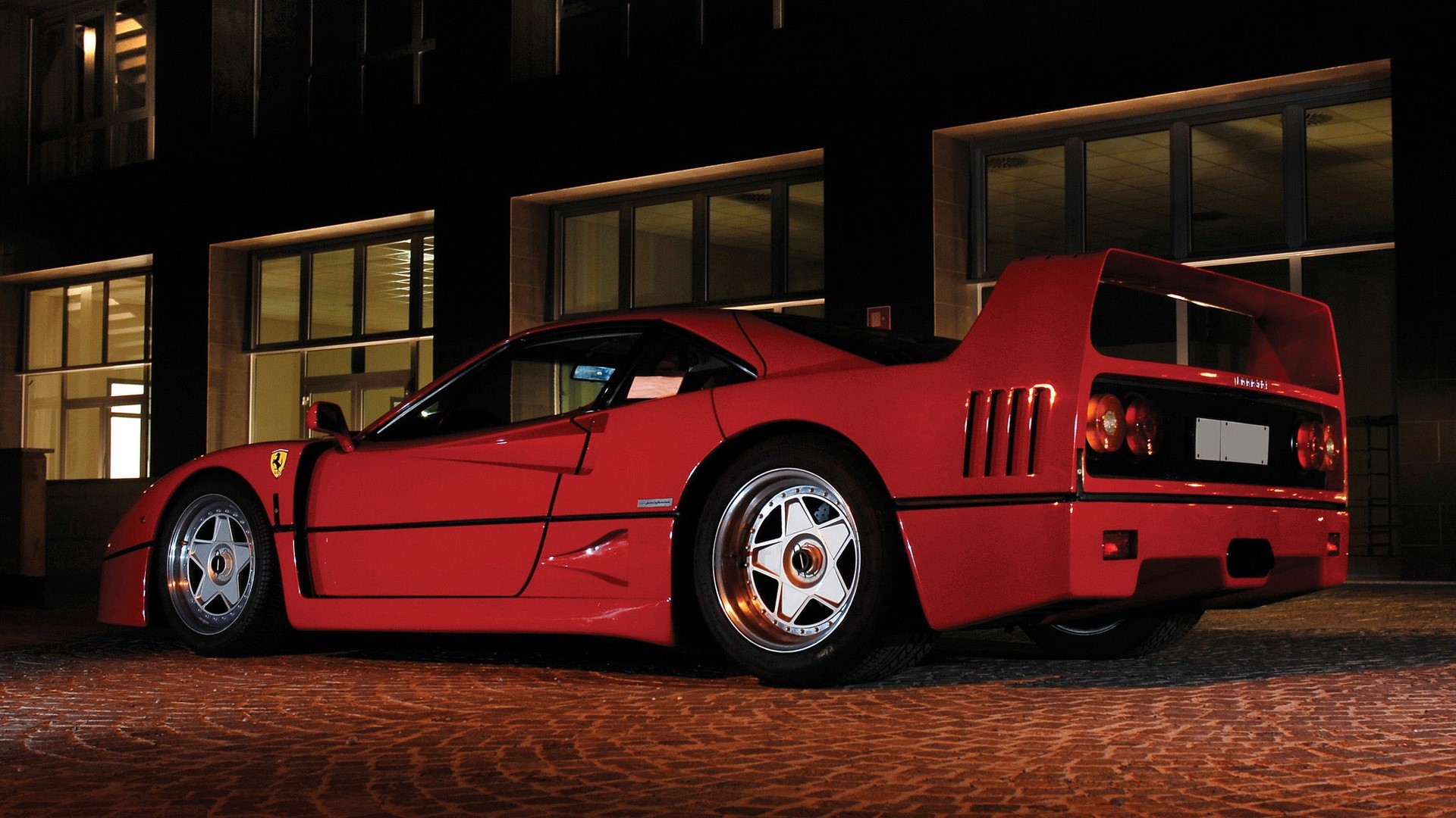 Red Ferrari F40 parked at night HD Wallpaper