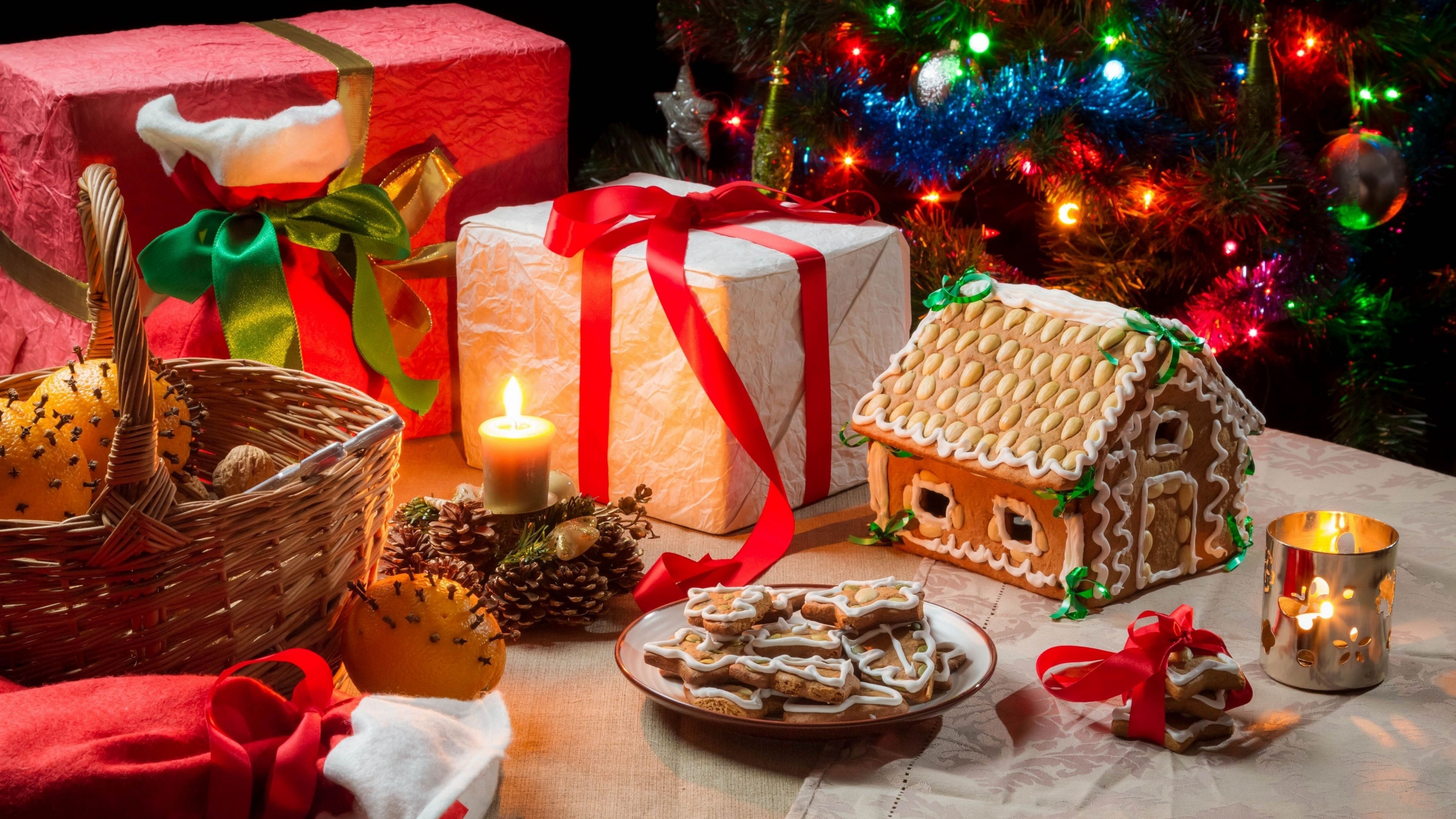 4K Christmas Tree with Gifts and Gingerbread House HD Wallpaper