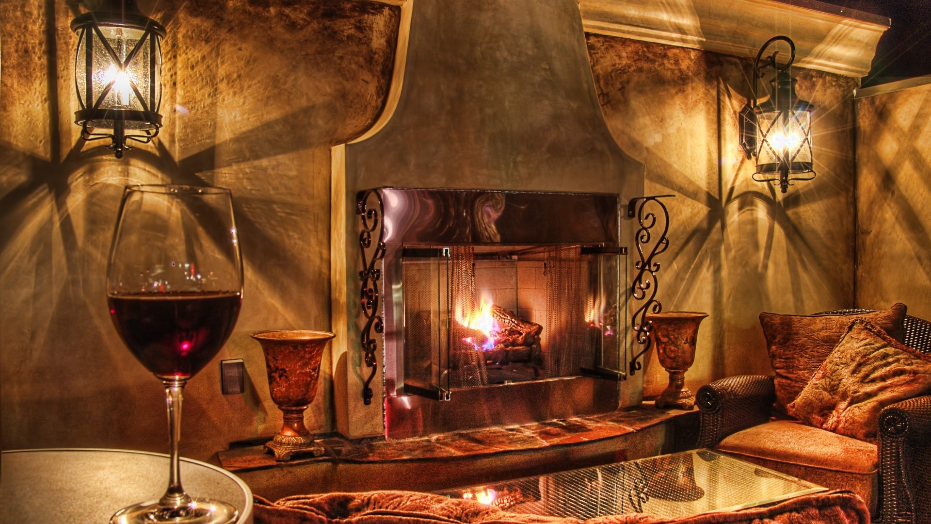 Cozy fireplace with a glass of red wine HD Wallpaper