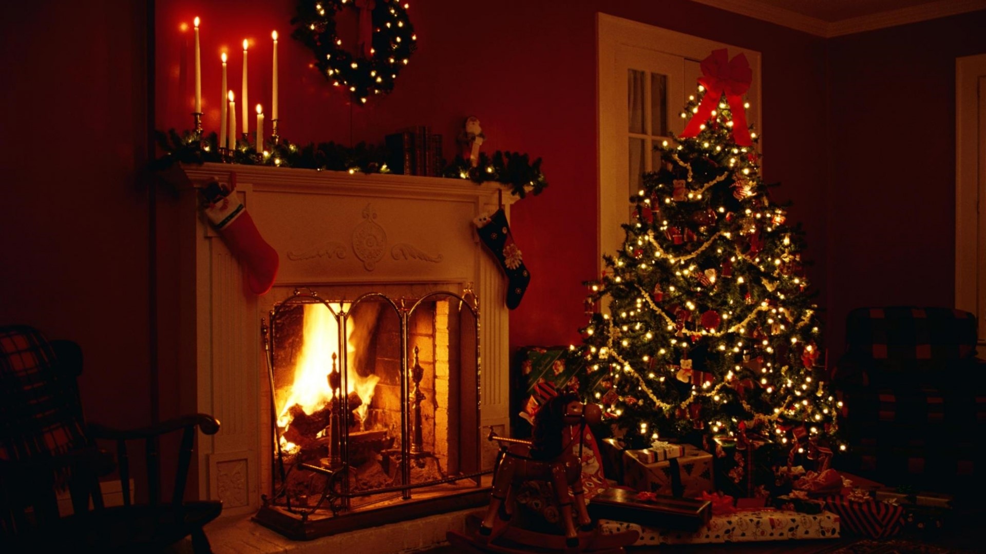 Christmas tree and fireplace with burning fire HD Wallpaper