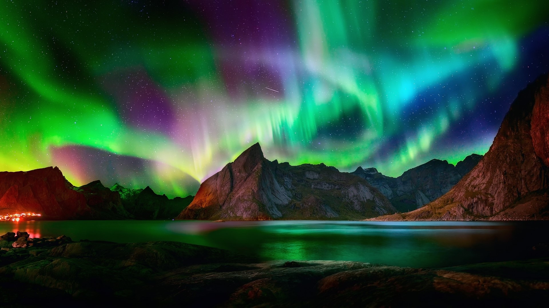 Aurora Borealis over mountains and lake HD Wallpaper