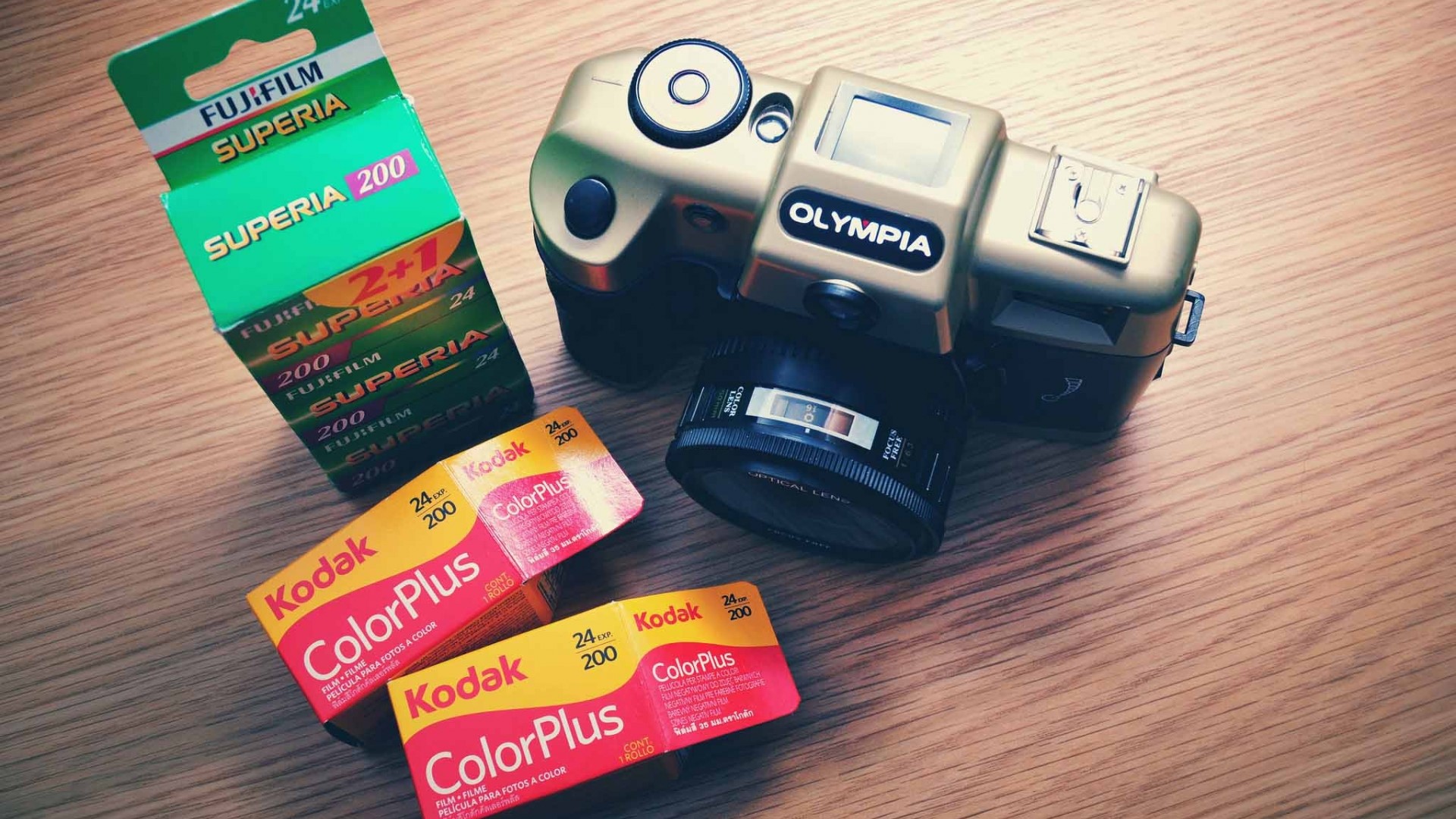 Olympia camera with Fujifilm and Kodak film HD Wallpaper