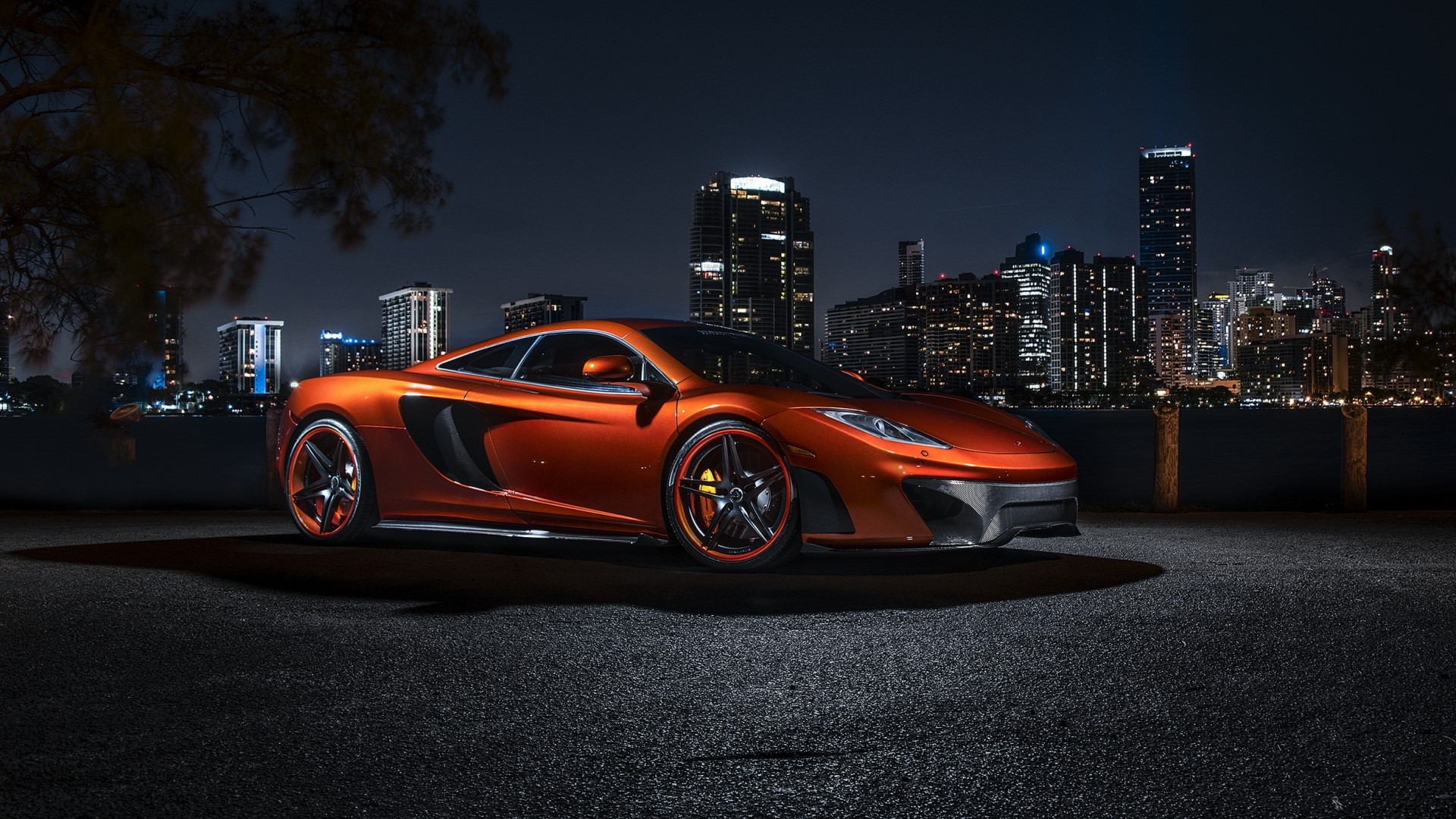 Orange McLaren MP4 VX parked at night HD Wallpaper