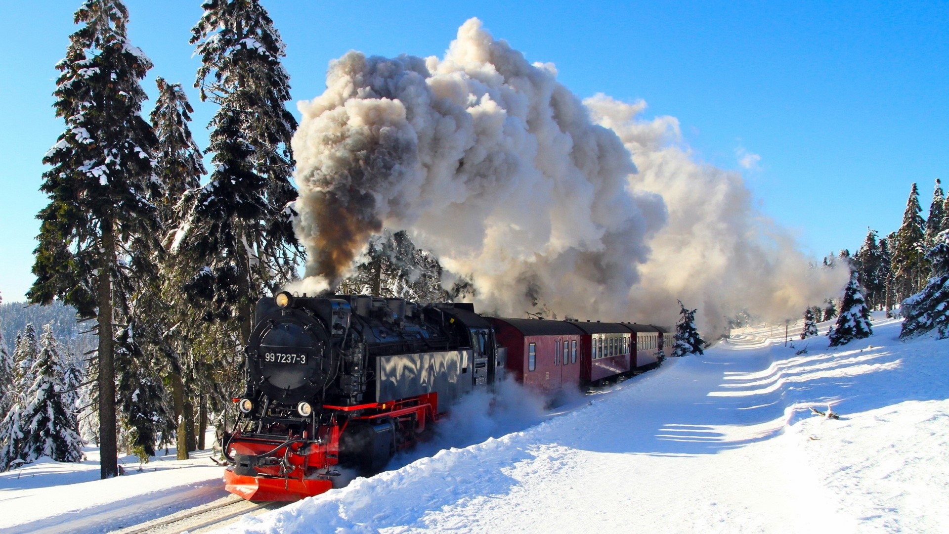 Steam locomotive 99 7237-3 in a snowy forest HD Wallpaper