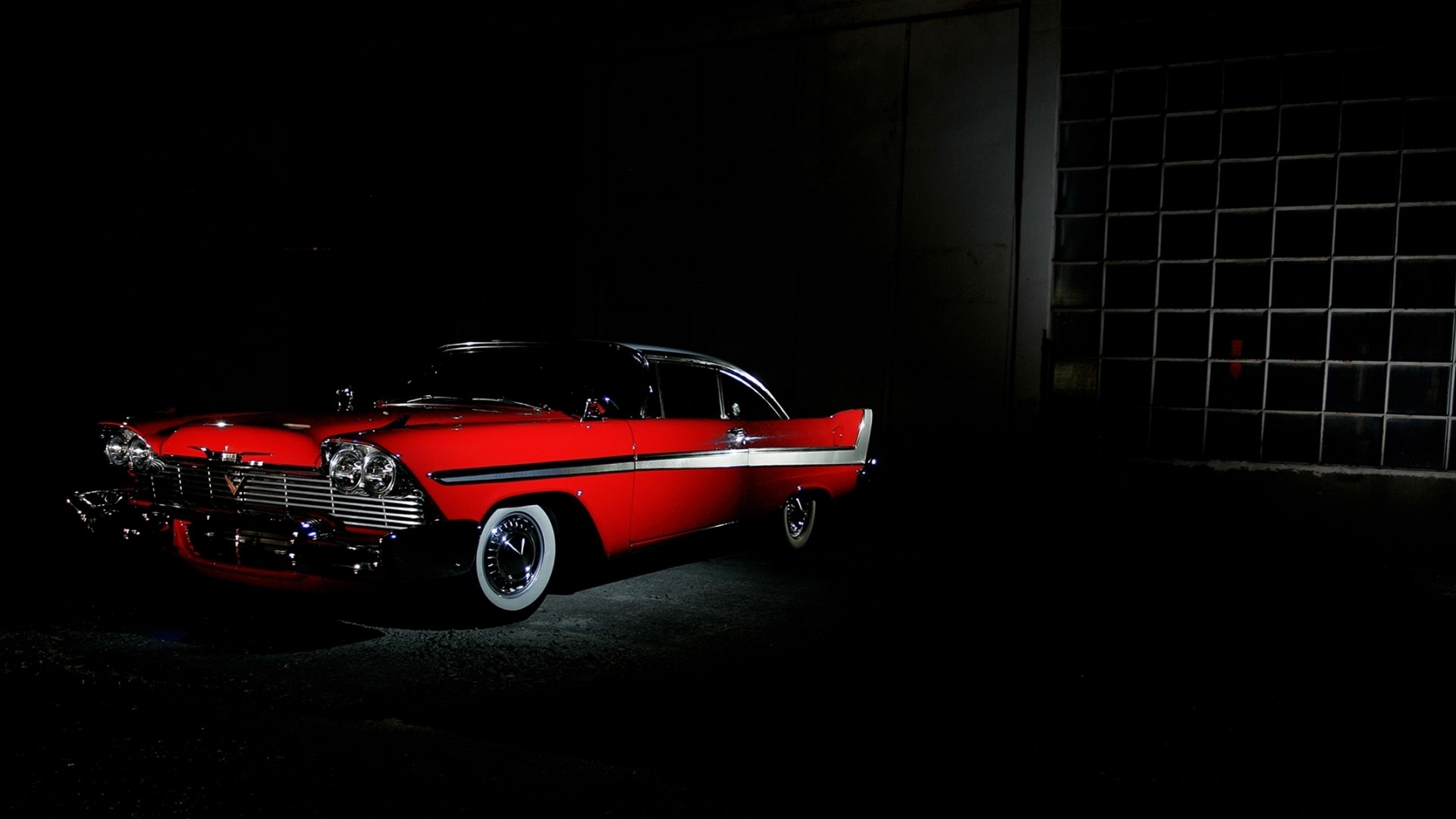 Red 1950s Plymouth Belvedere in a dark garage HD Wallpaper