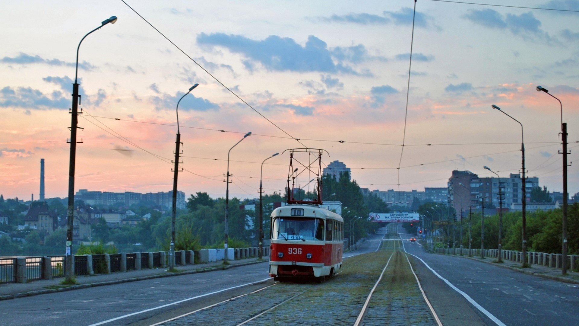 Tram 936 on a bridge in Donetsk at sunrise HD Wallpaper