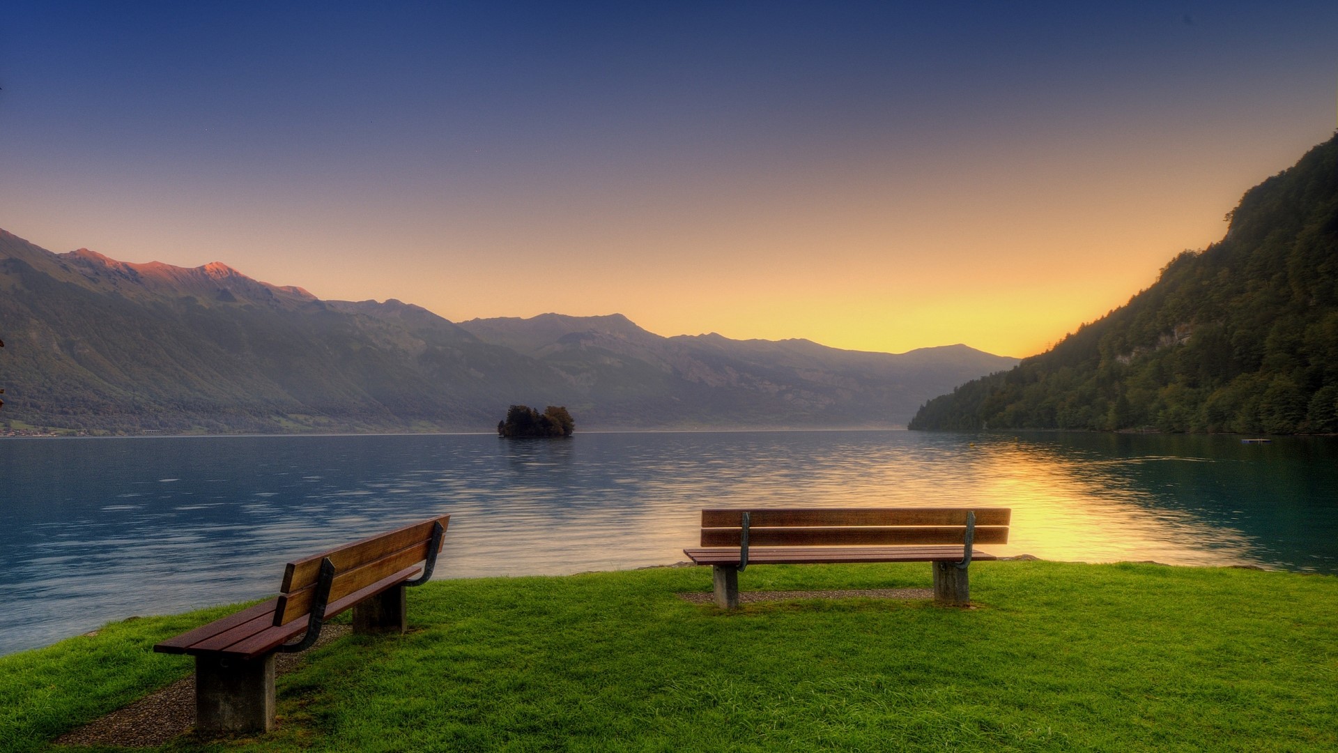 Two benches by a lake at sunset HD Wallpaper