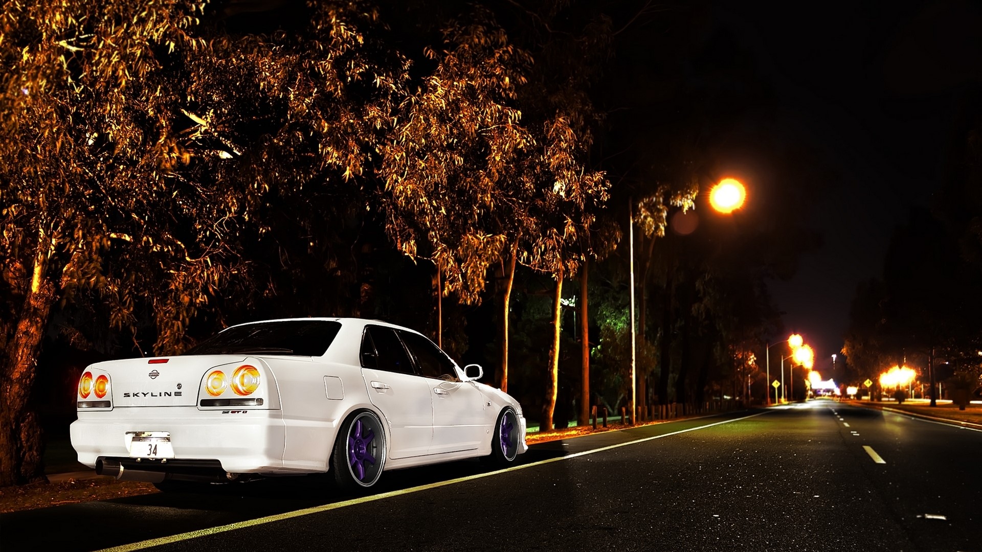 White Nissan Skyline sedan parked at night HD Wallpaper