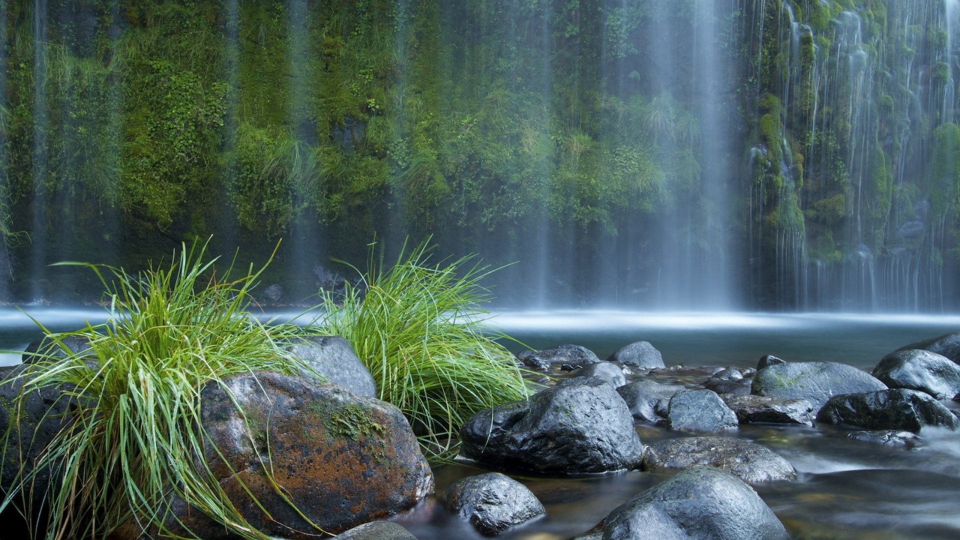Waterfall with mossy rocks and grass HD Wallpaper