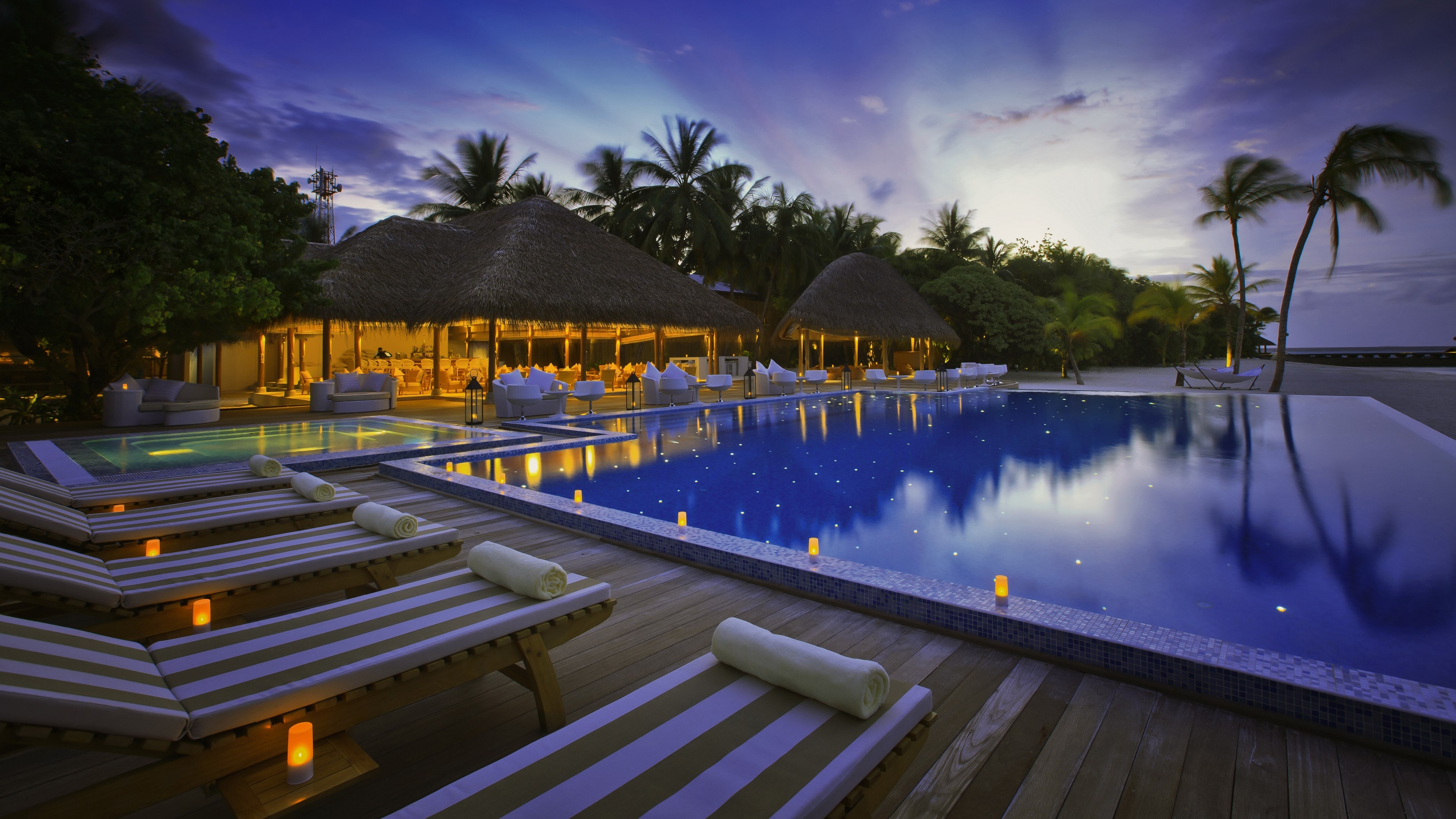 4K Resort with Pool and Beach at Dusk HD Wallpaper