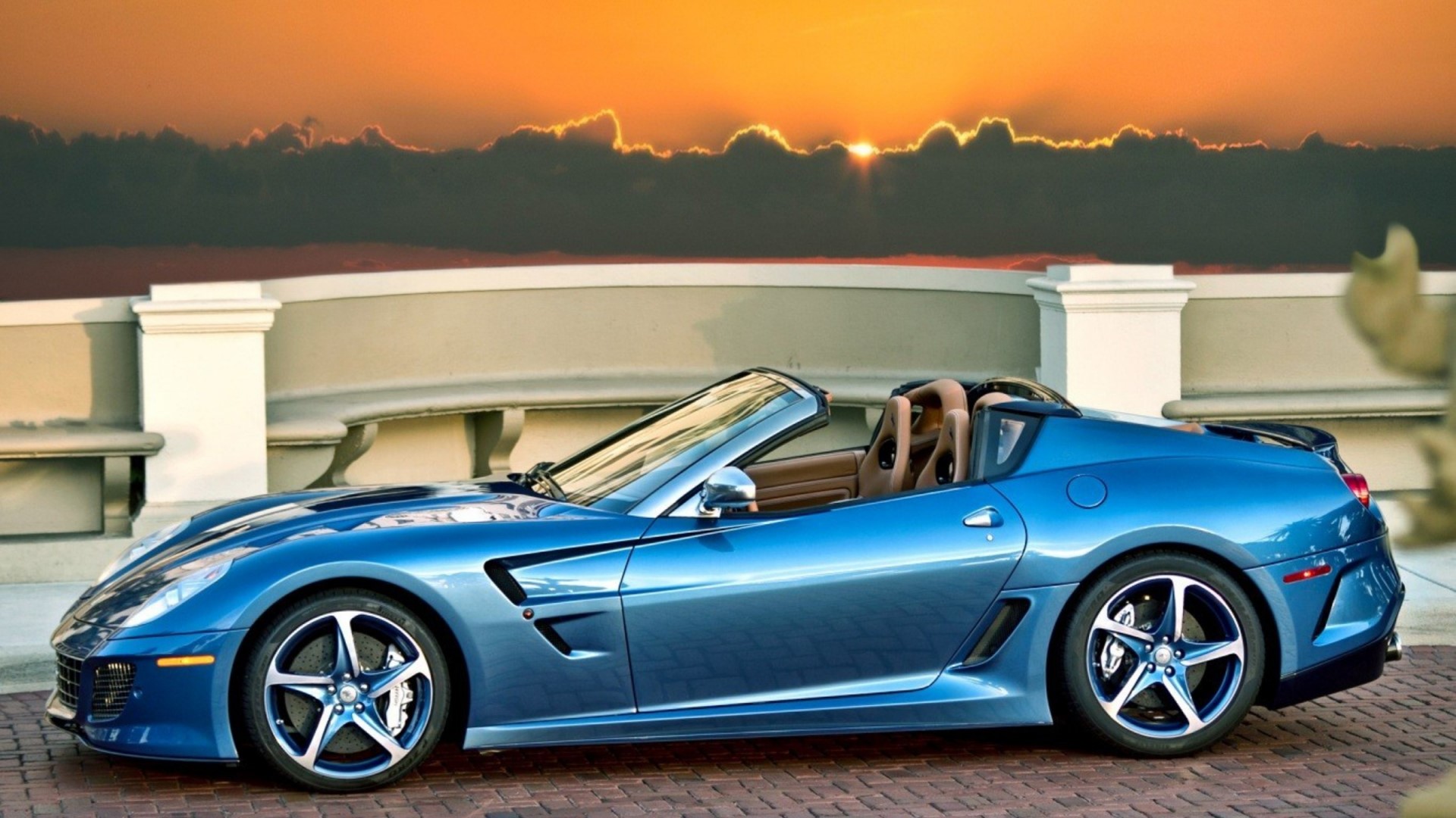 Blue Ferrari convertible at sunset HD Wallpaper