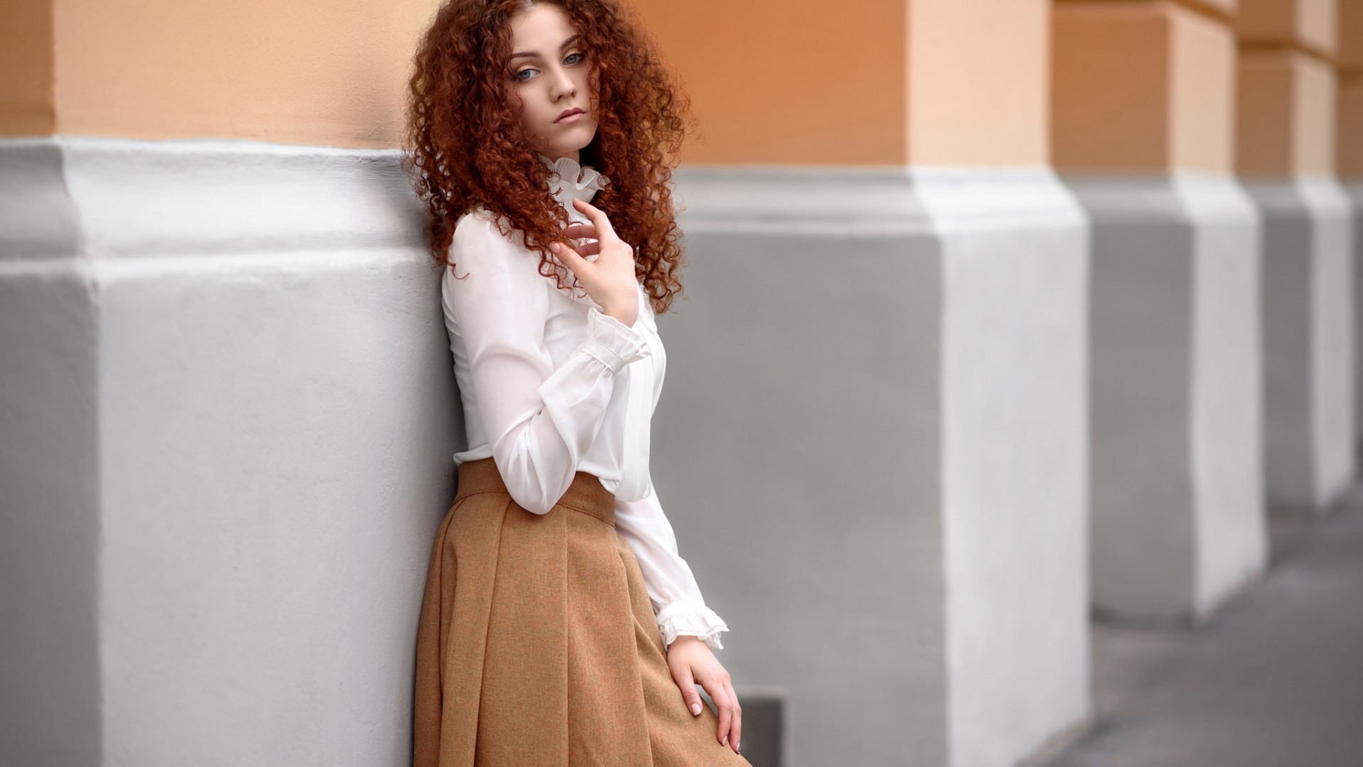 Young woman with curly red hair HD Wallpaper