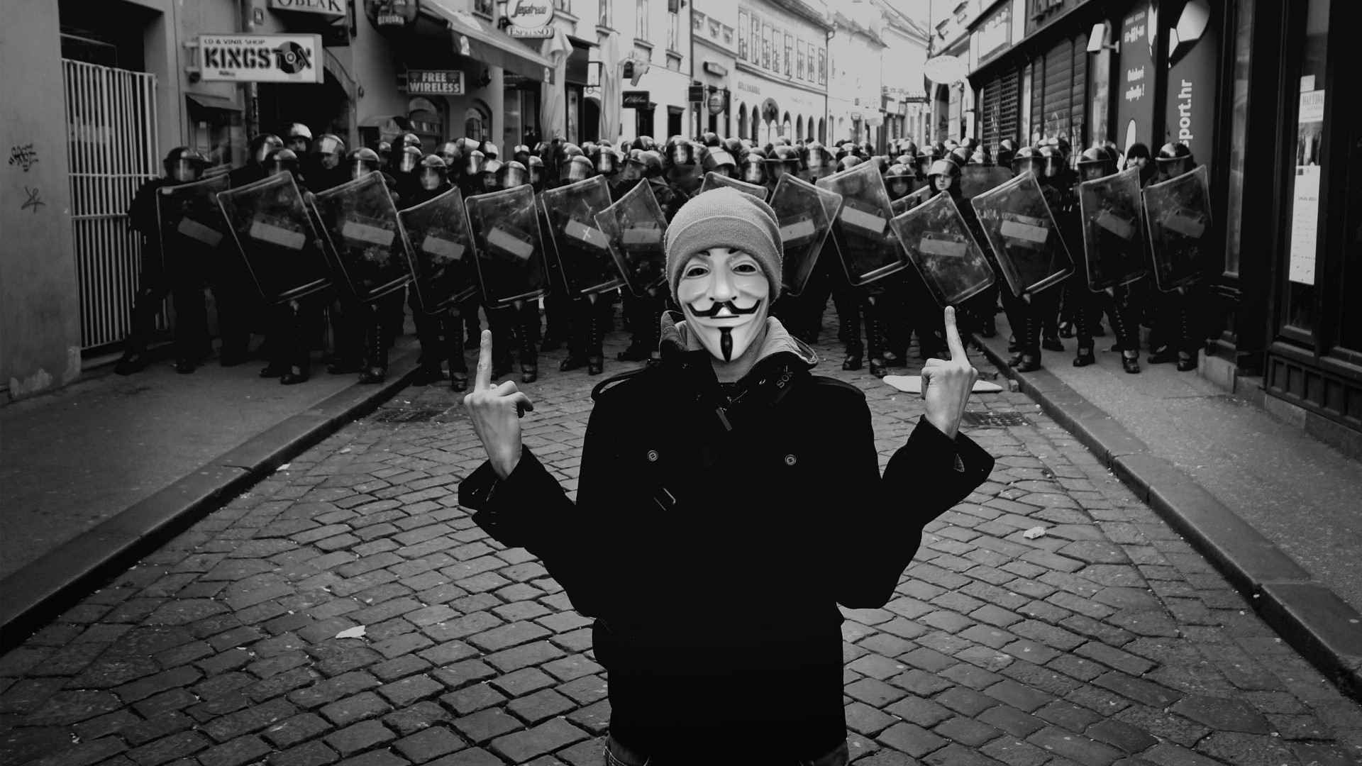 Anonymous protester with riot police HD Wallpaper