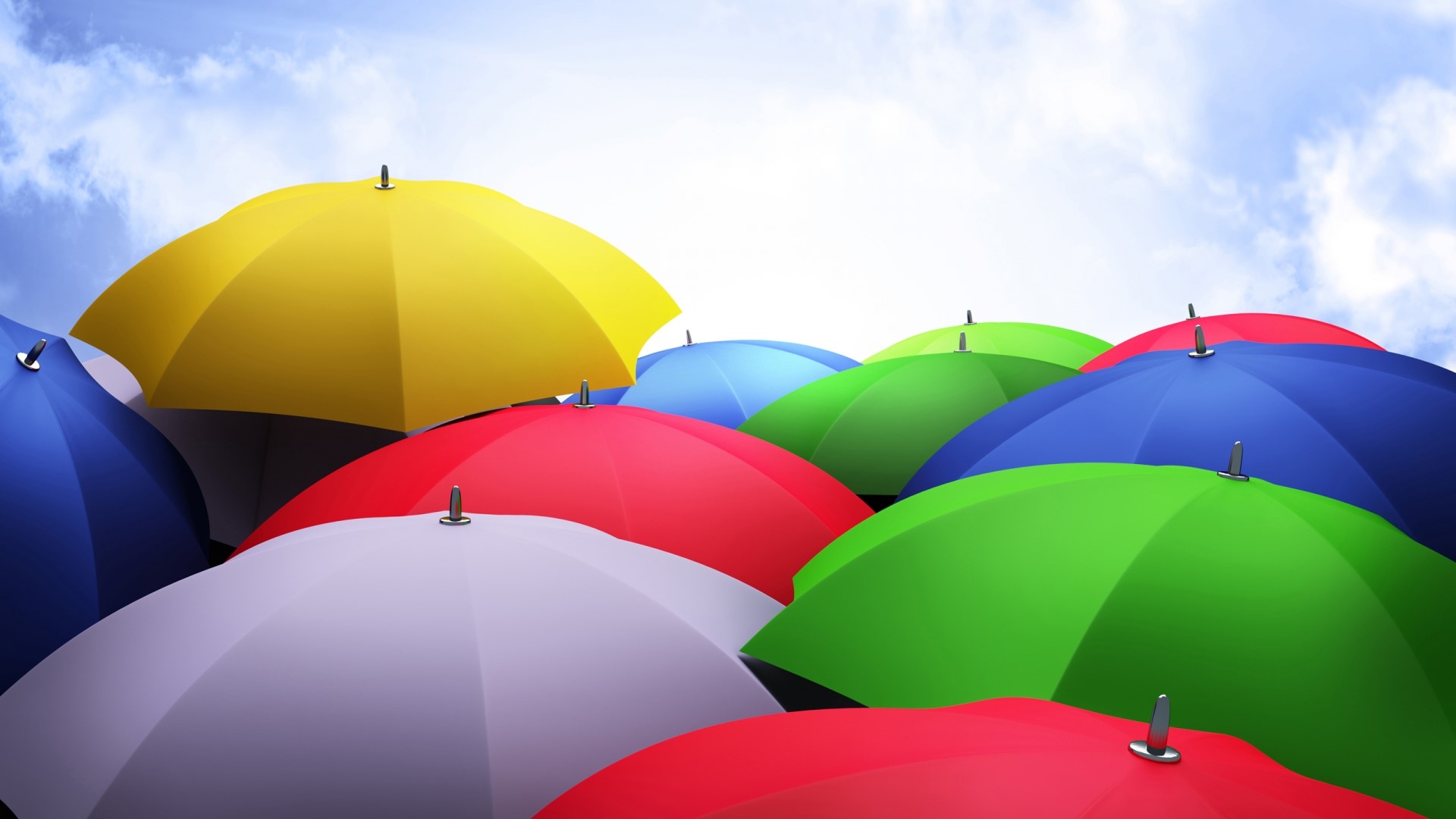 Colorful Umbrellas Under a Cloudy Sky HD Wallpaper