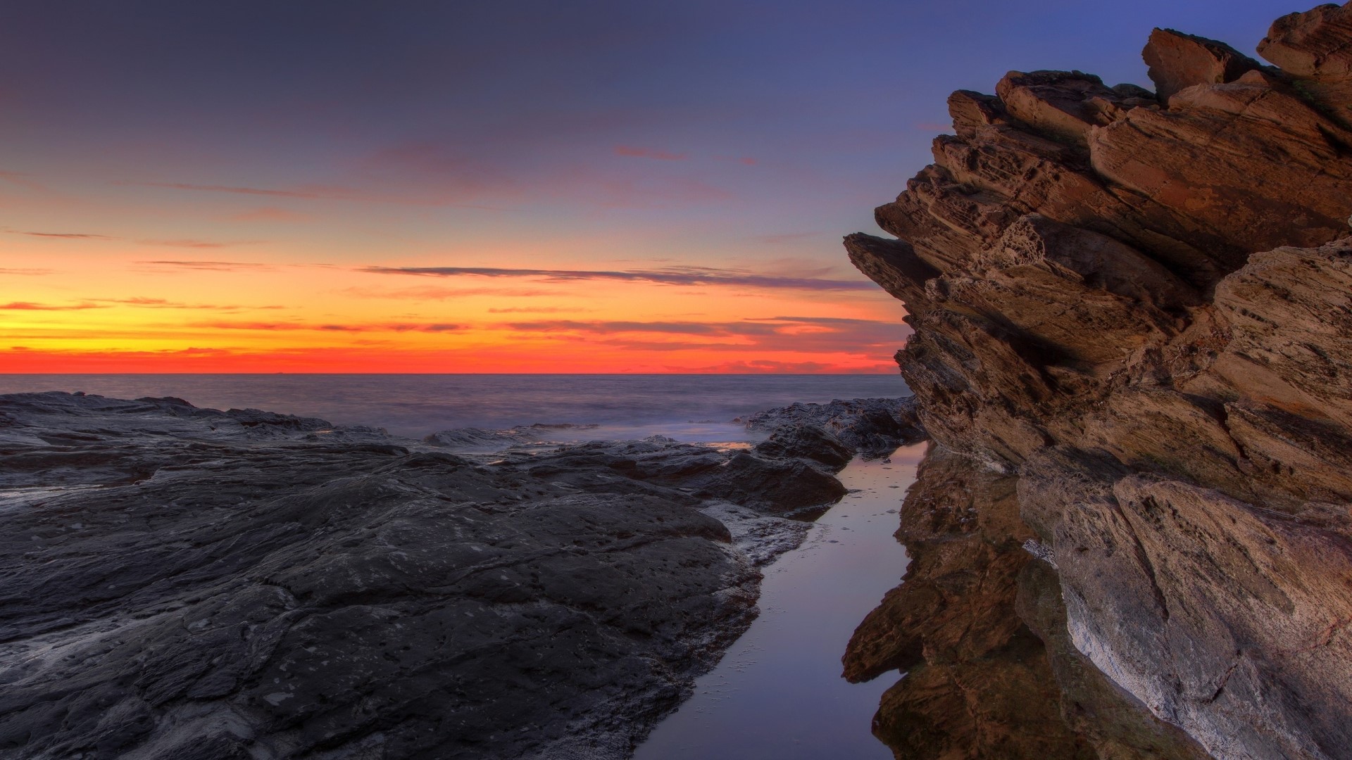 Rocky Coastline at Sunset HD Wallpaper