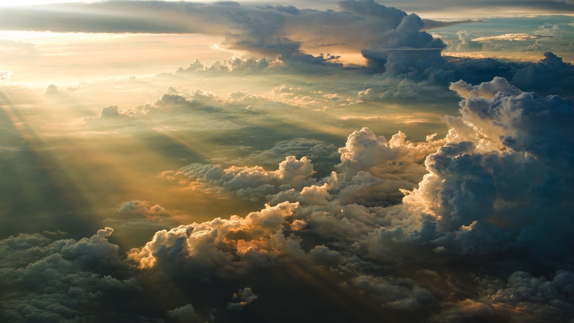 Sunlight Rays Through Clouds from Above HD Wallpaper