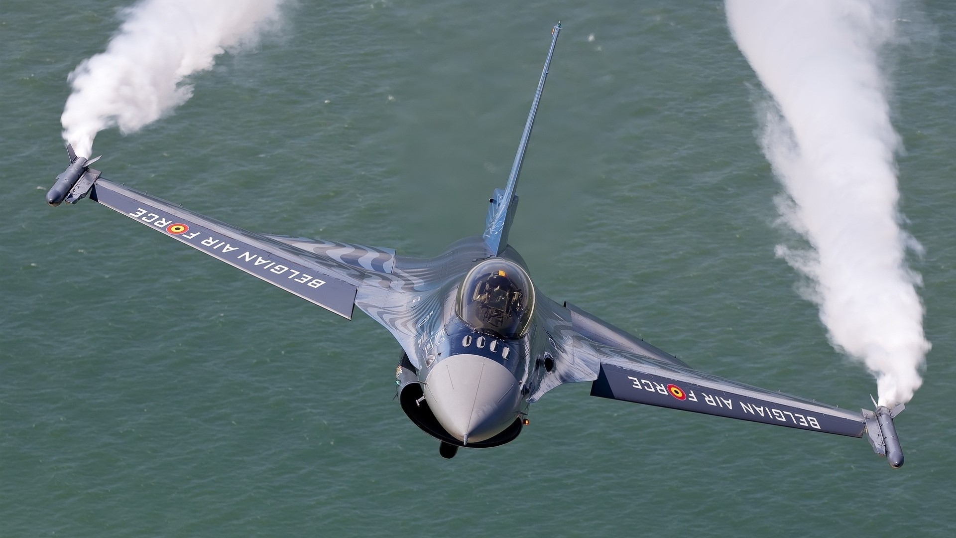Belgian Air Force F-16 fighter jet performing aerobatics HD Wallpaper