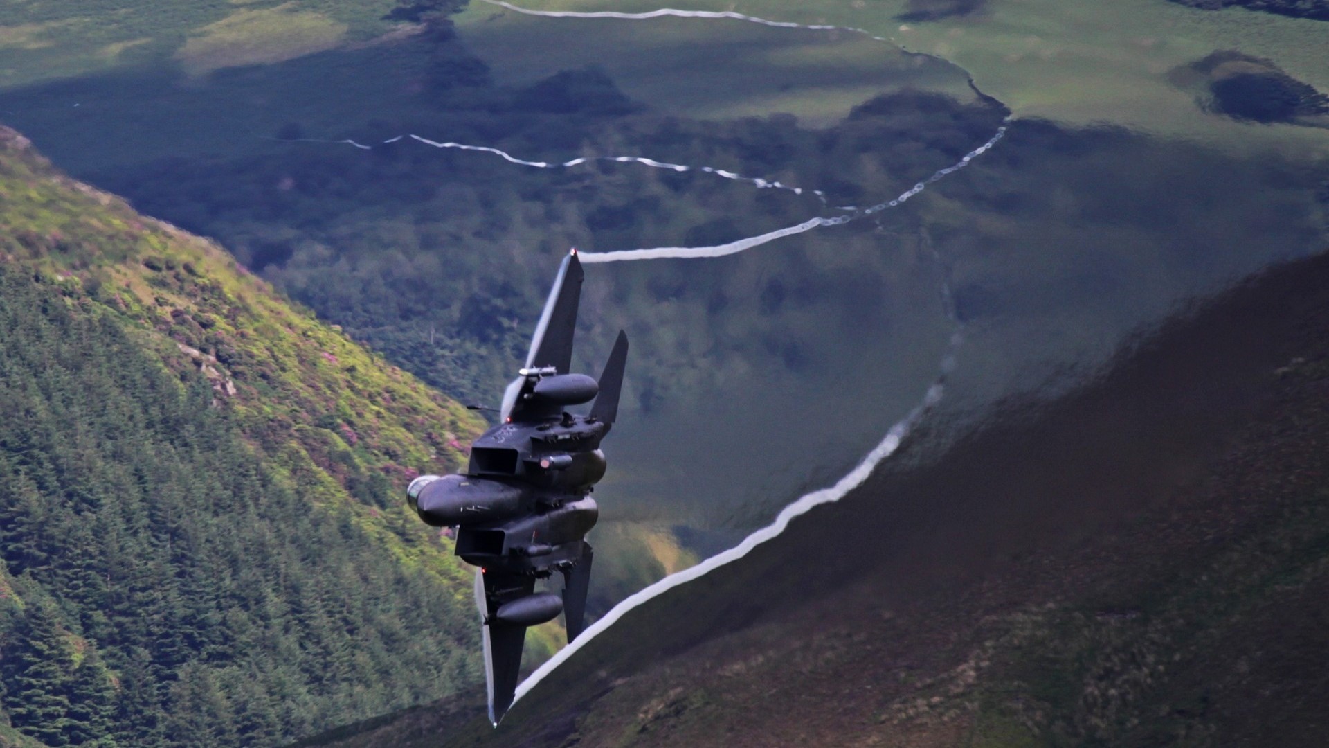 F-15 Eagle jet leaving contrails over mountains HD Wallpaper