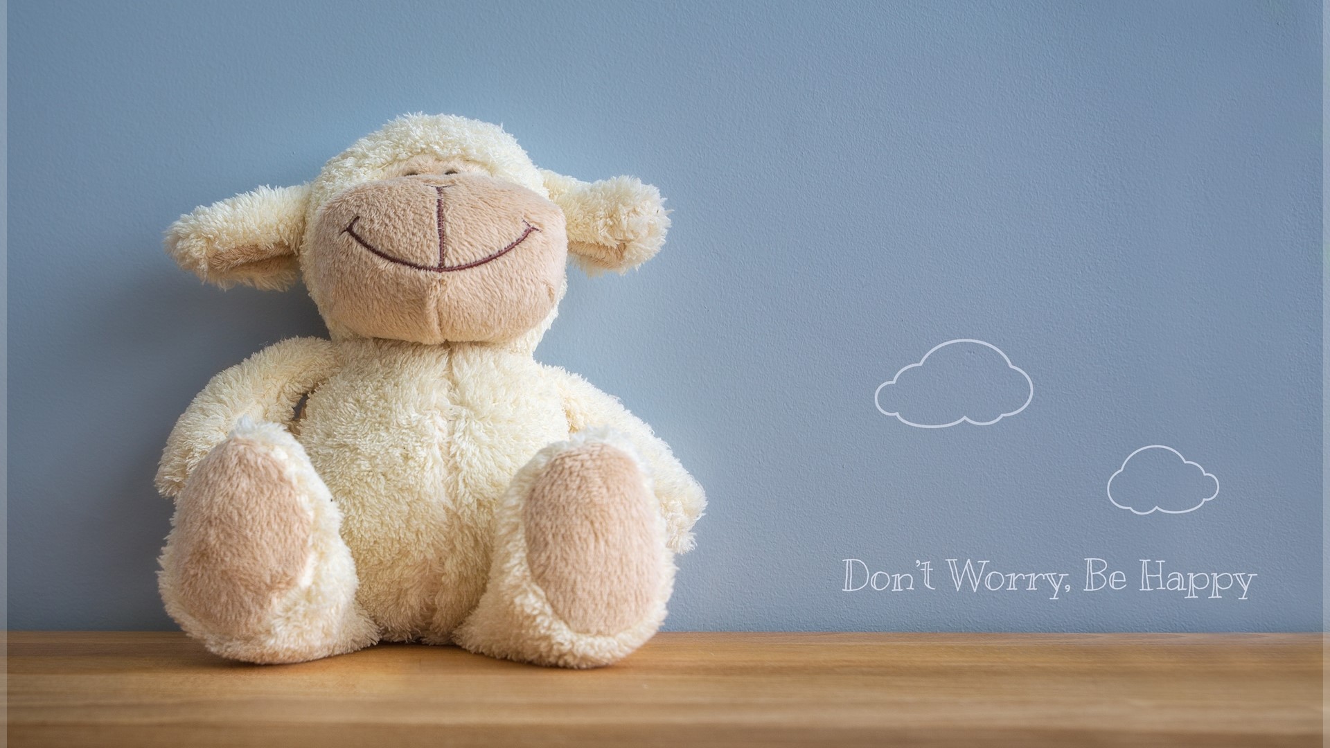 Plush sheep with clouds and text HD Wallpaper