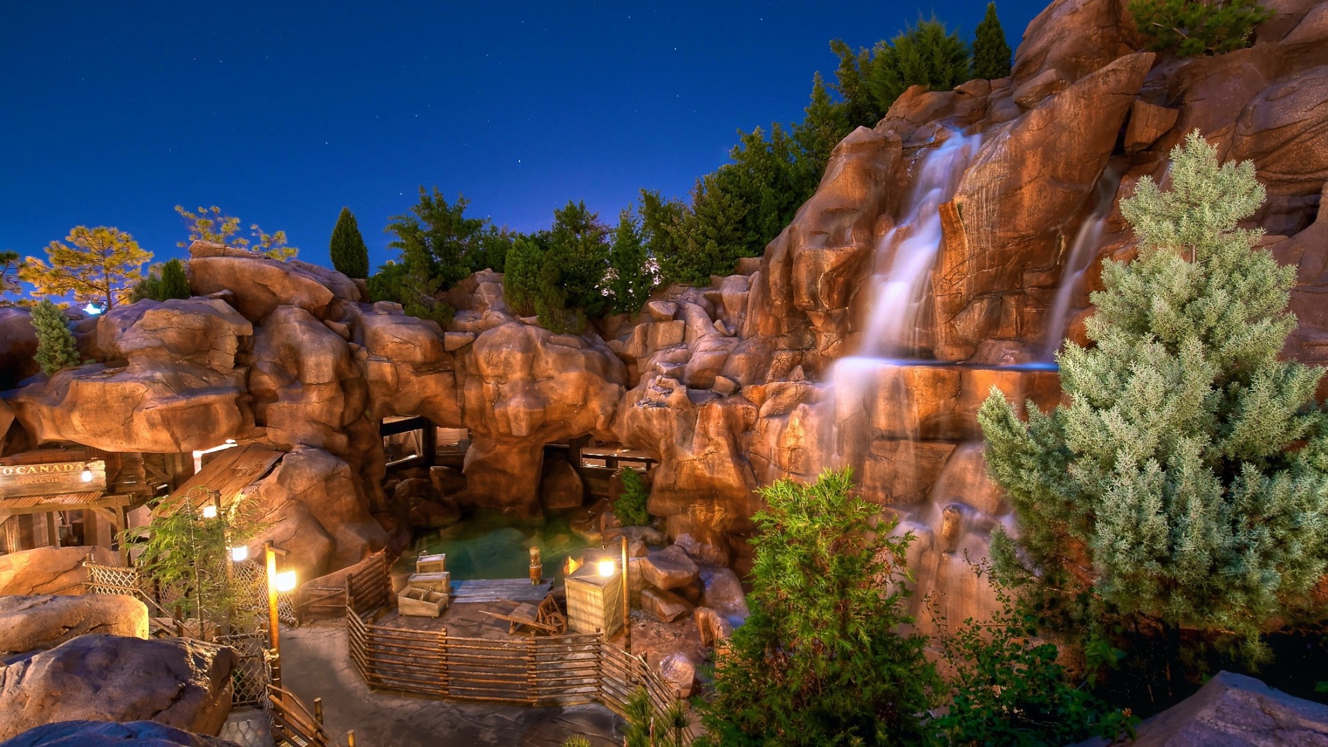 The park at night with waterfall and rocks HD Wallpaper