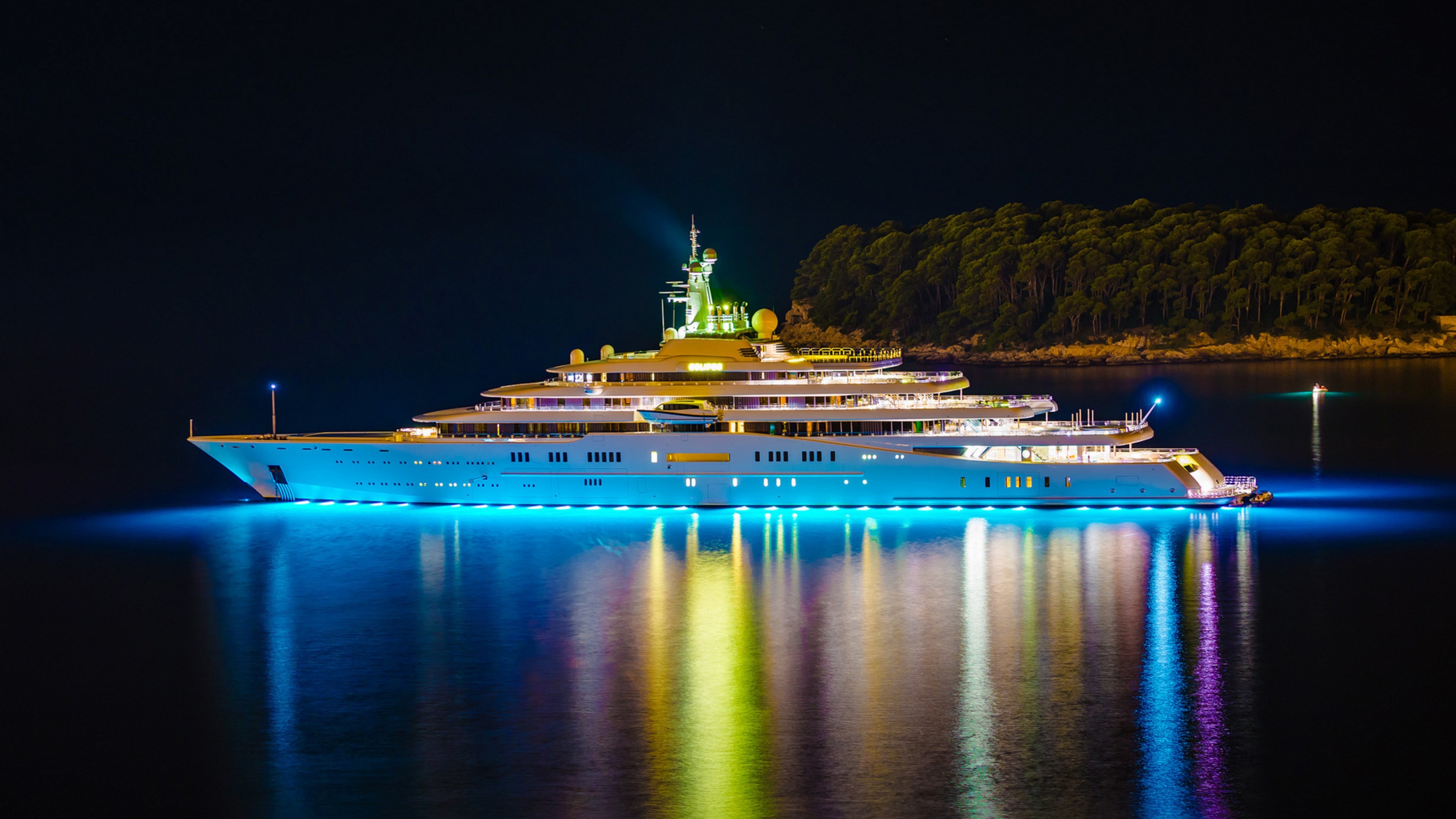 4K Yacht at Night with Blue Lights HD Wallpaper