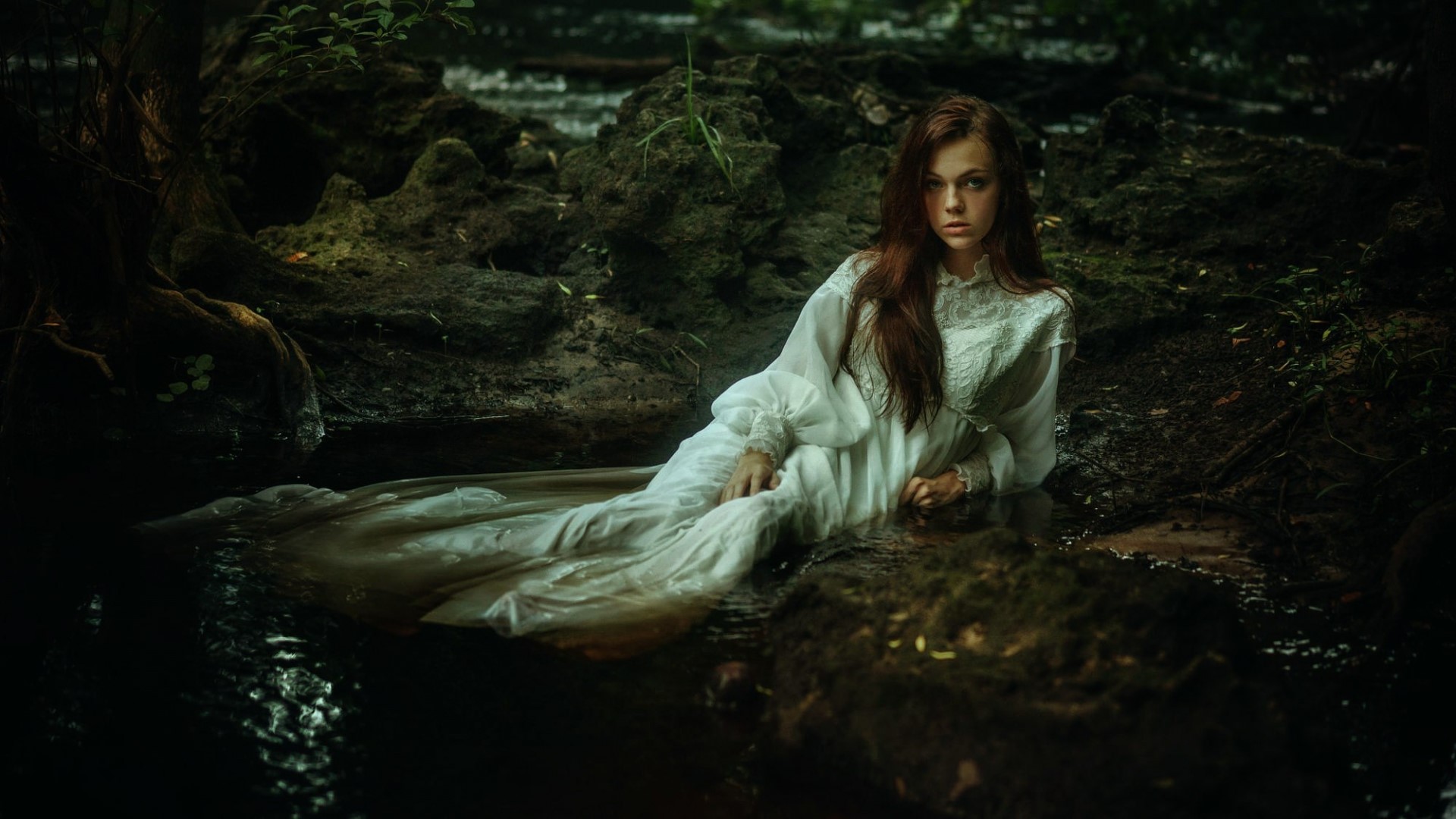 A girl in a white dress in a dark forest stream HD Wallpaper