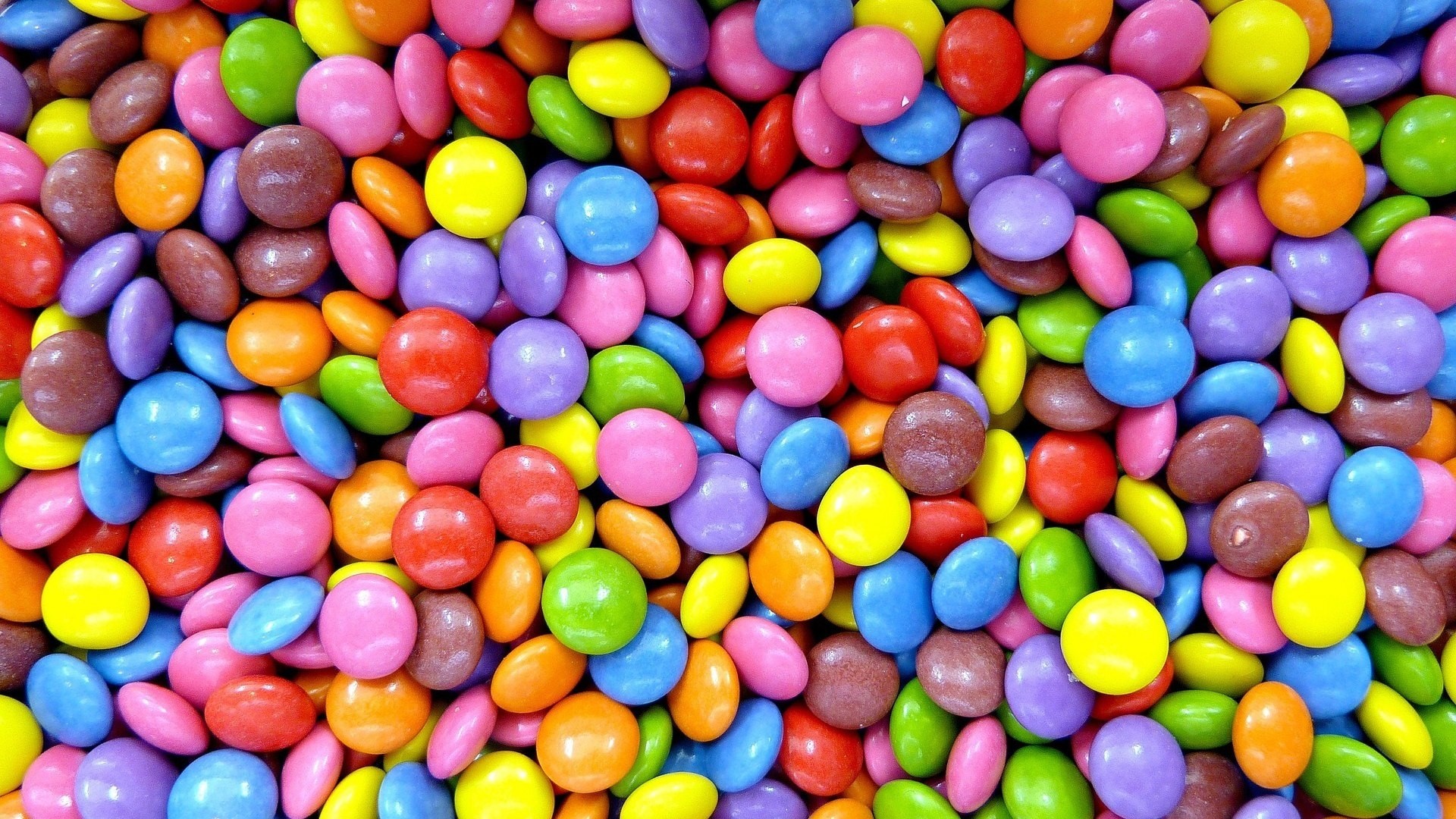 Colorful candy pieces scattered HD Wallpaper