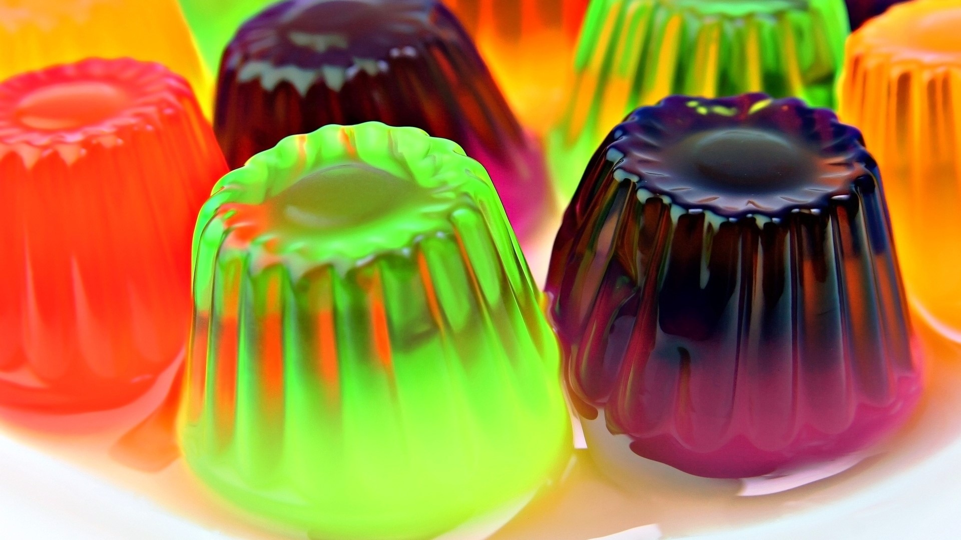 Assortment of colorful gelatin desserts HD Wallpaper