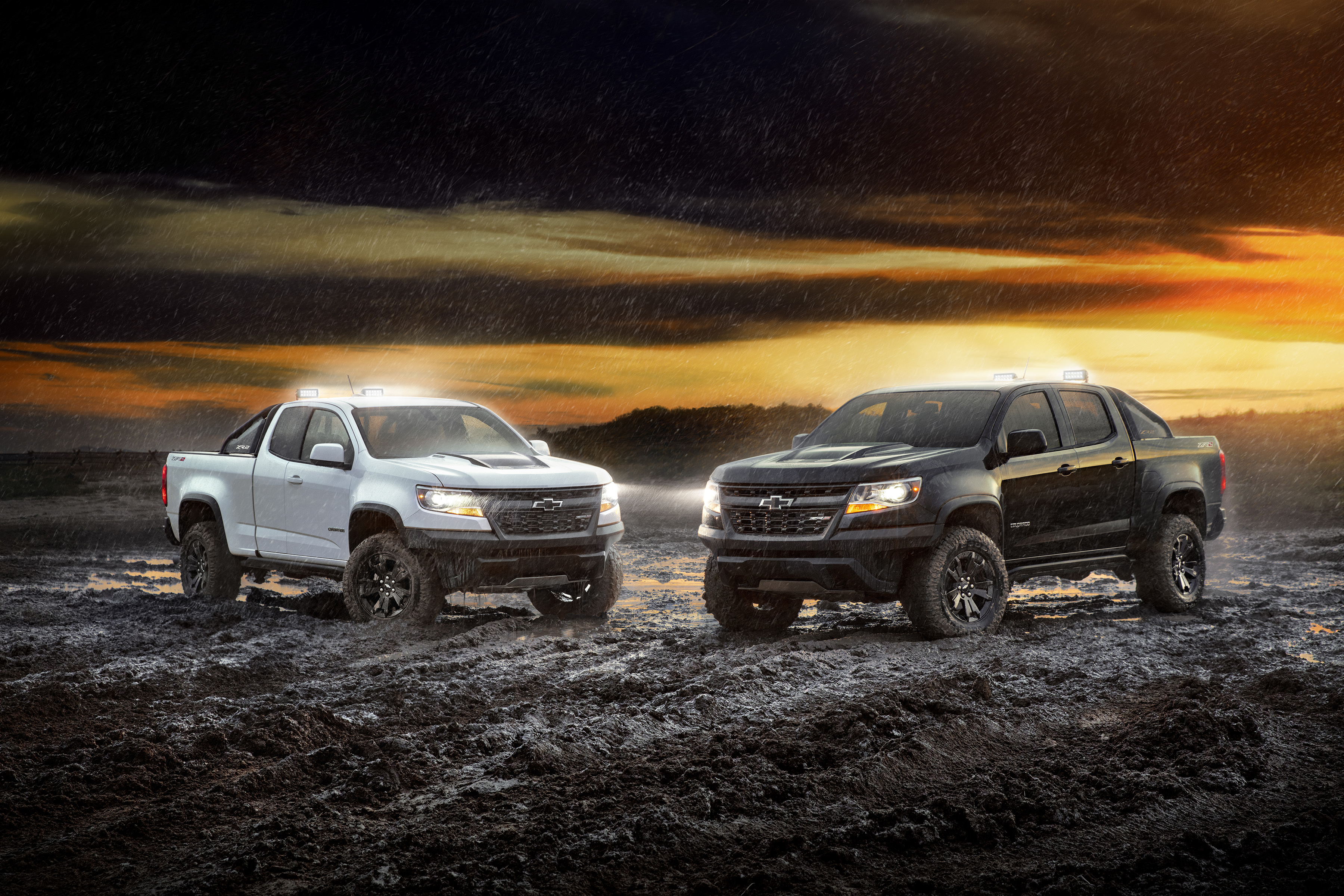 4K Chevrolet Colorado ZR2 trucks in mud HD Wallpaper