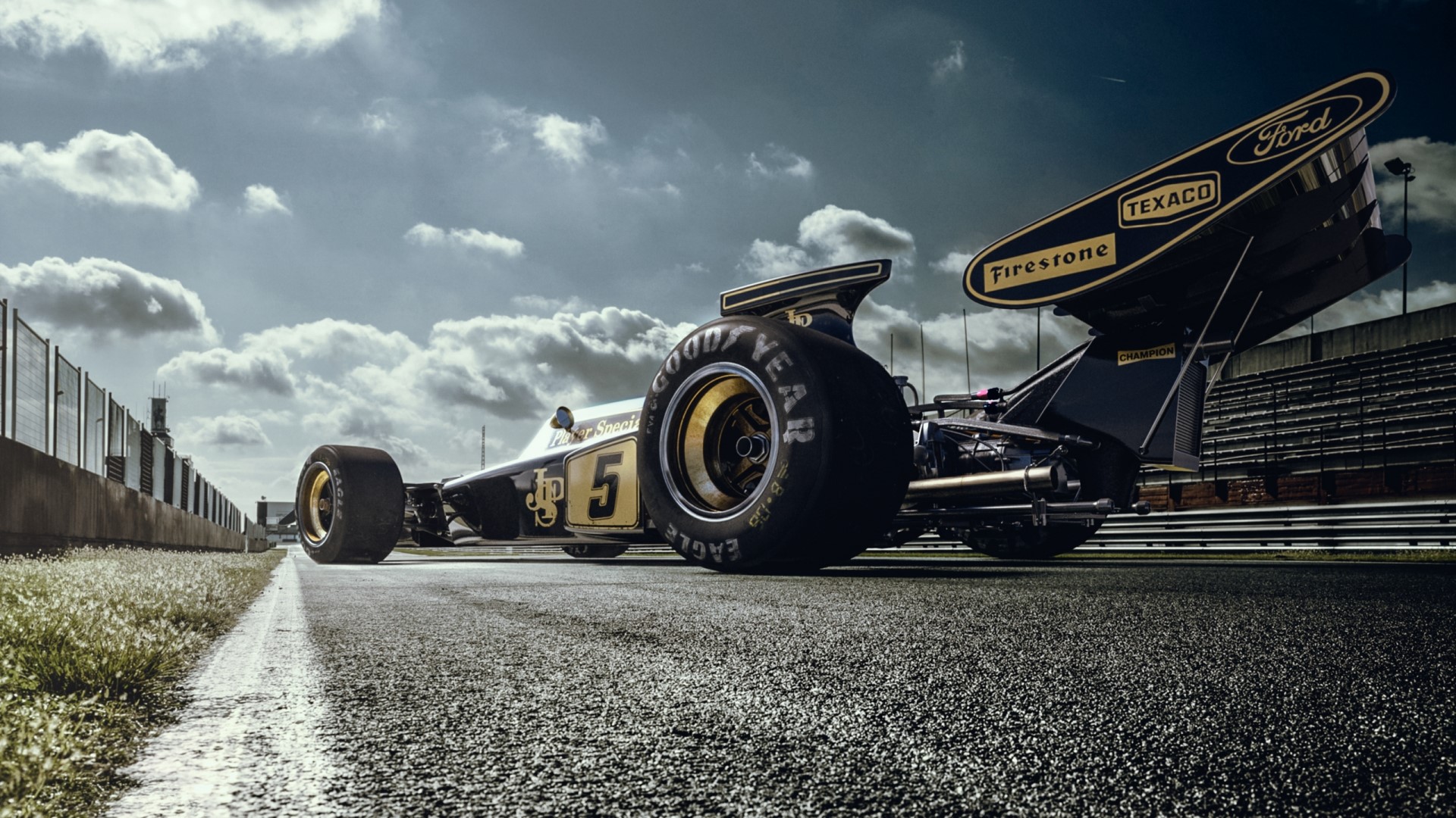 Lotus 72d Formula 1 car on a race track HD Wallpaper