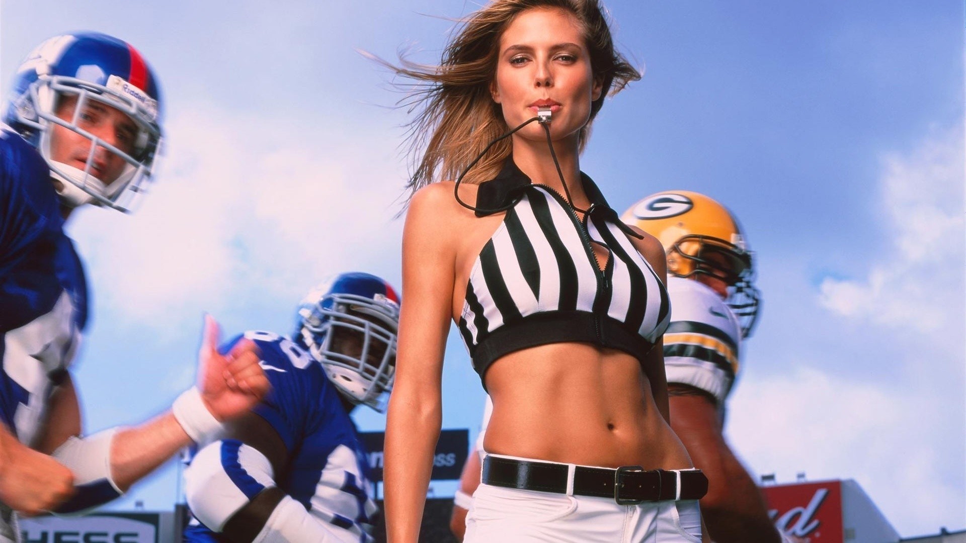 Heidi Klum as NFL Referee with Football Players HD Wallpaper