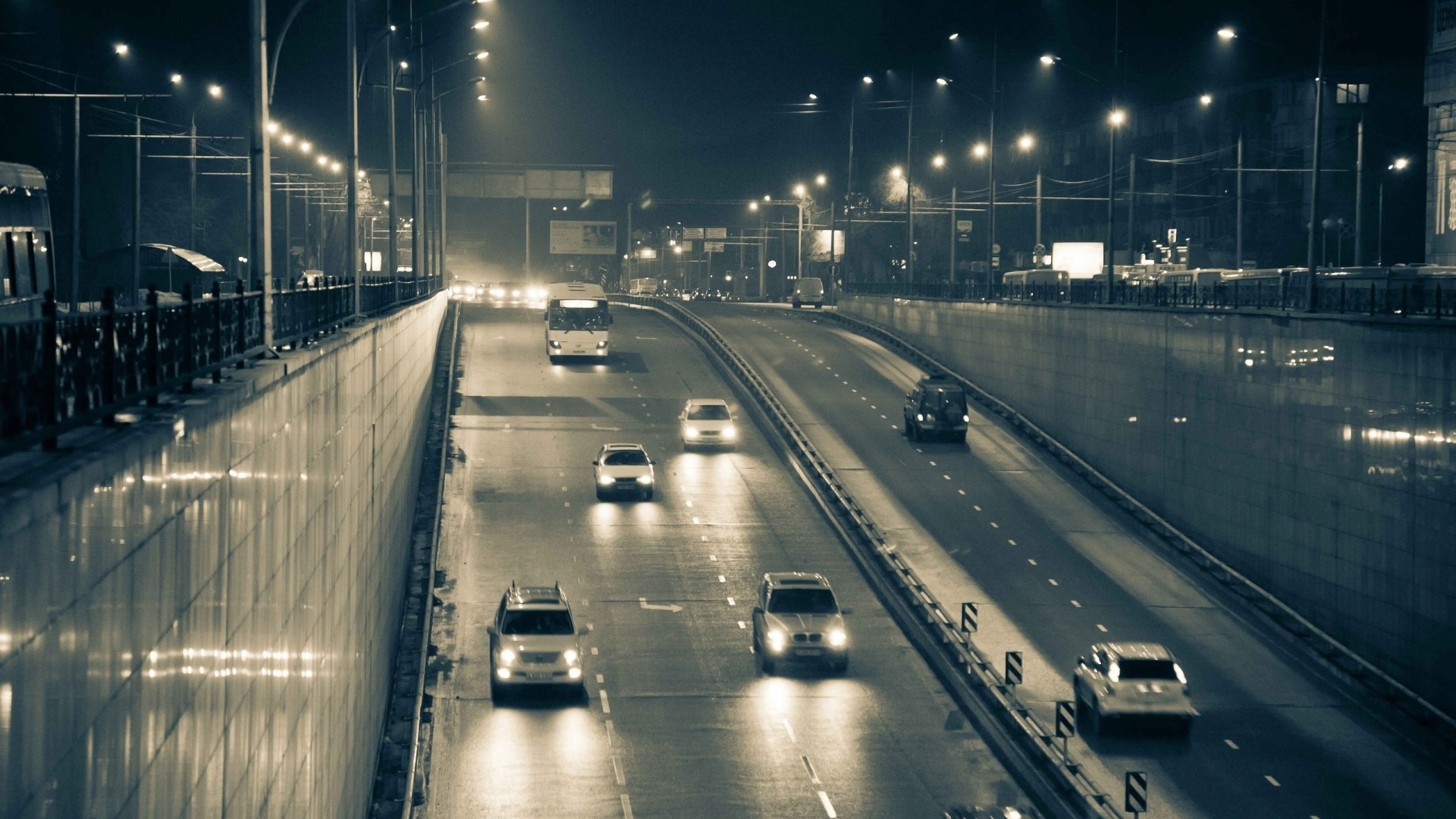 Nighttime highway with cars and streetlights HD Wallpaper