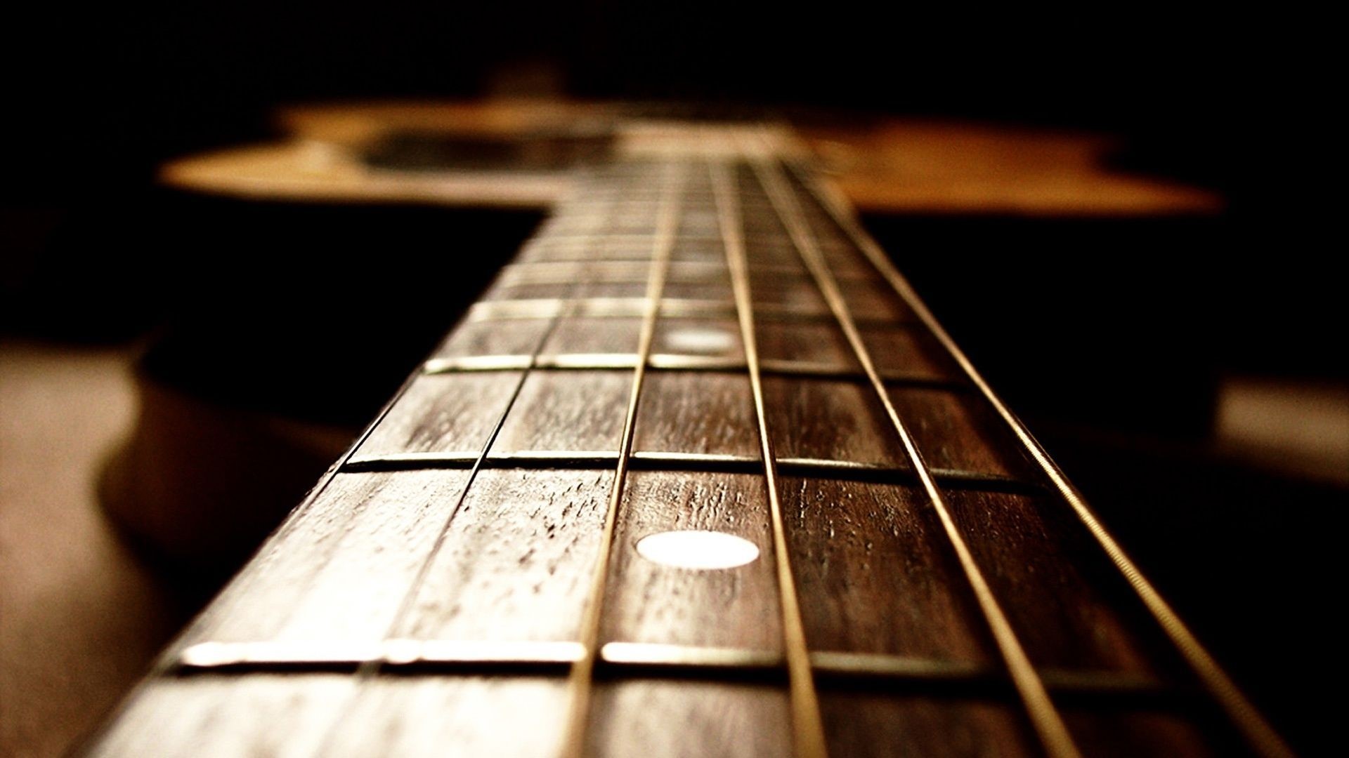 Close-up of Acoustic Guitar Fretboard HD Wallpaper