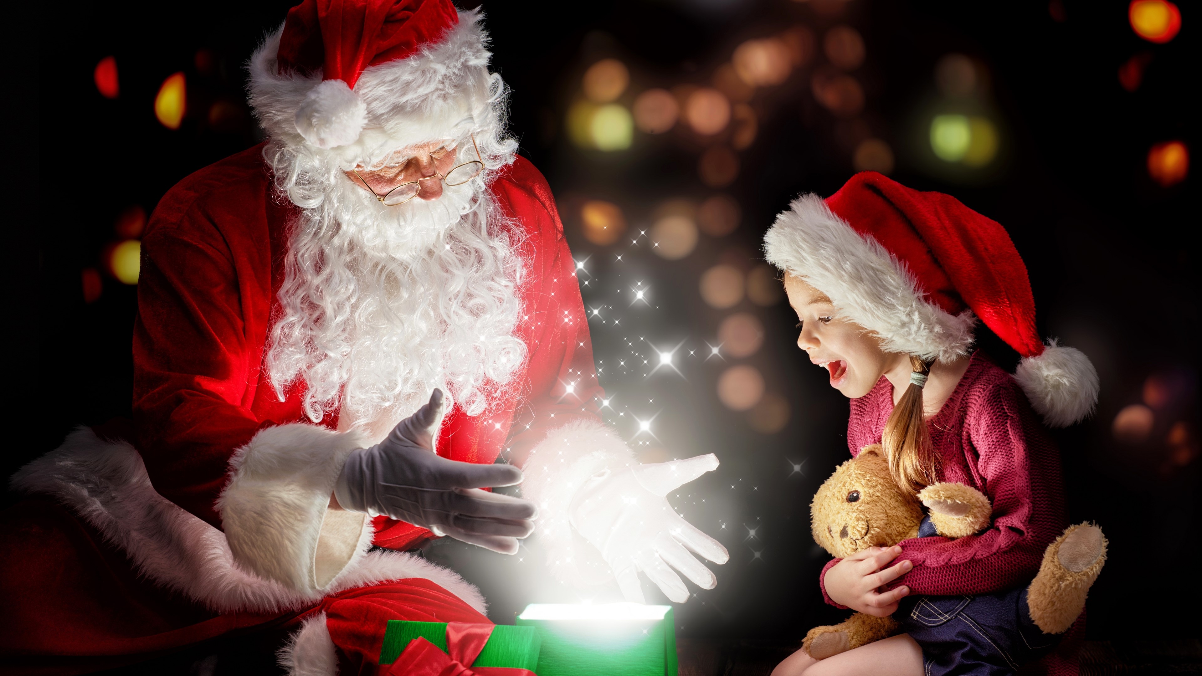 Santa Claus and a girl with a gift HD Wallpaper