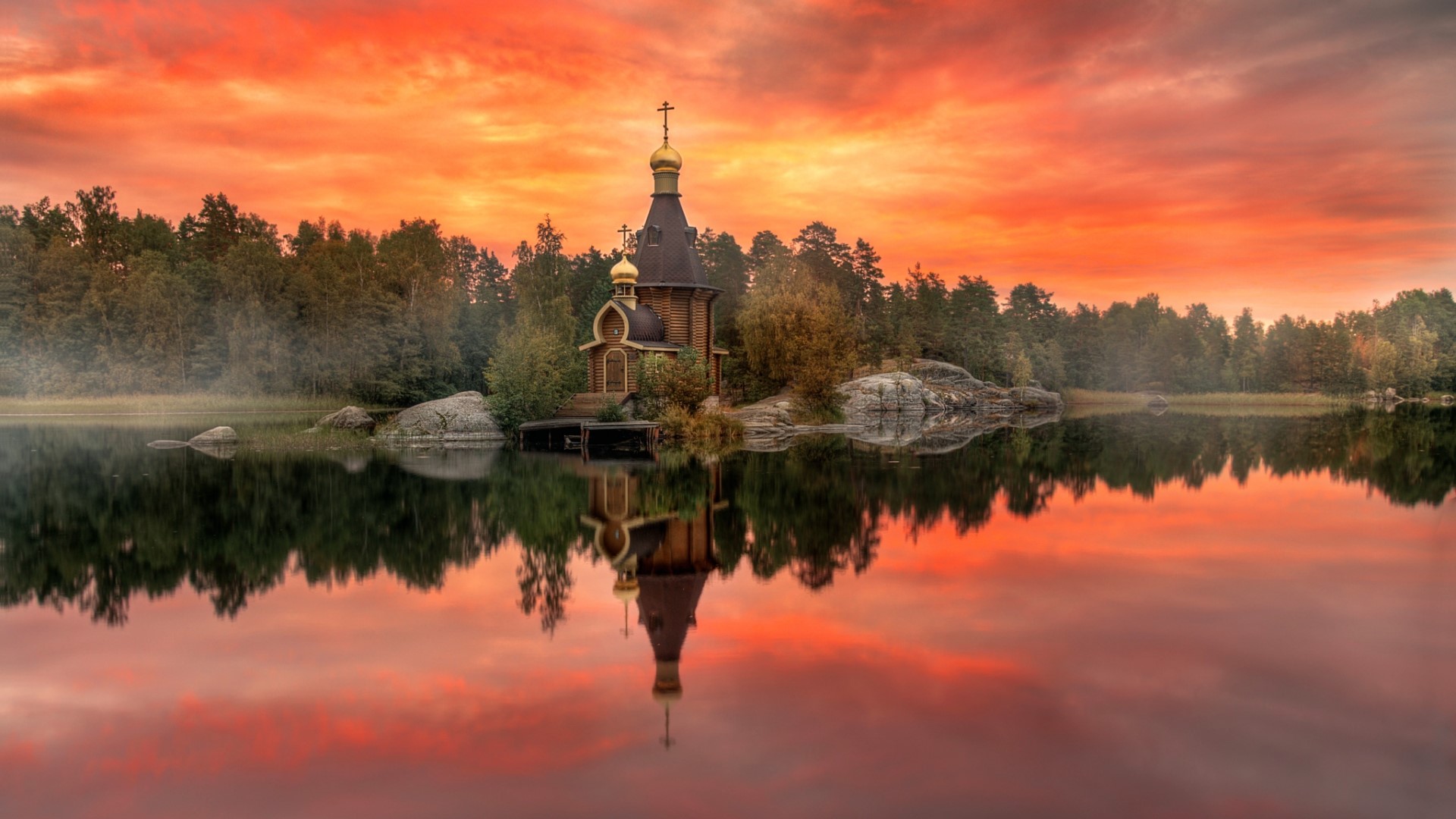 Wooden Orthodox church on a lake at sunset HD Wallpaper