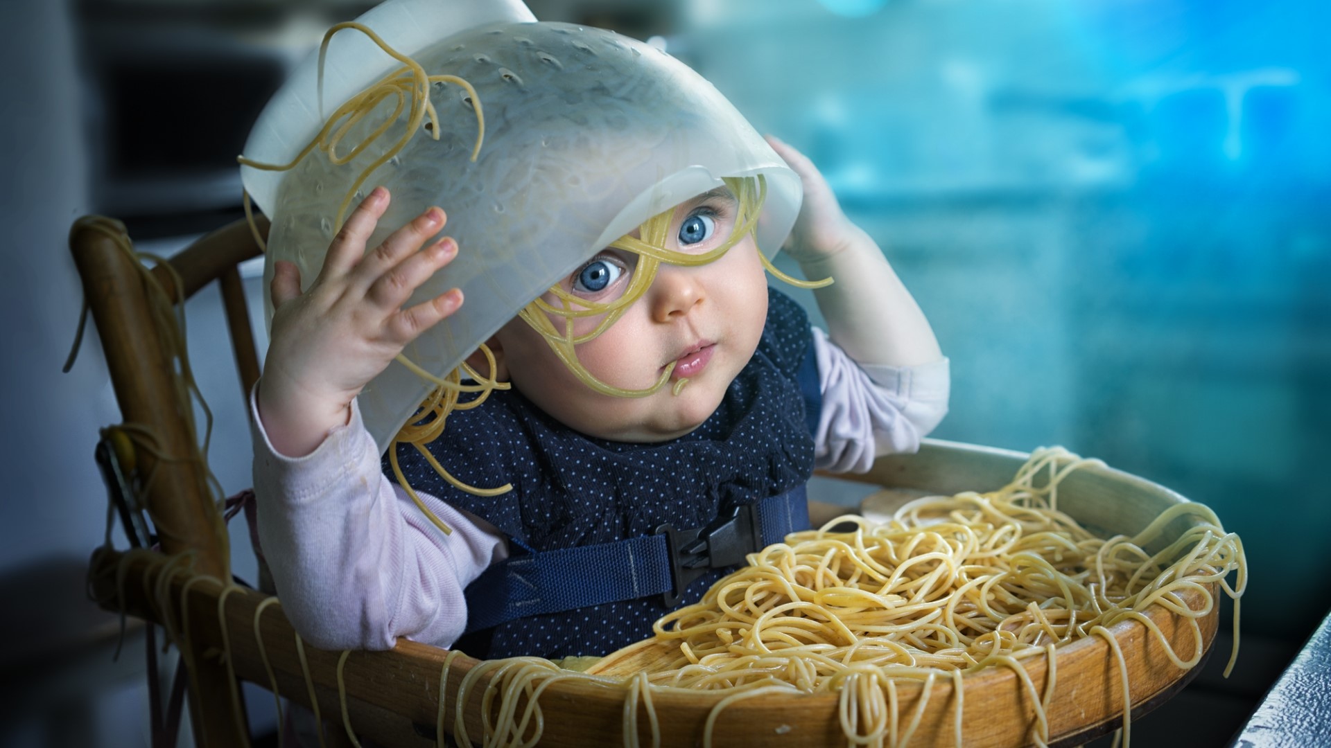 Baby wearing a colander full of spaghetti HD Wallpaper