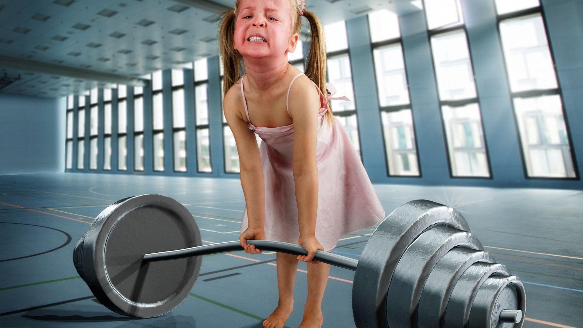 Girl lifting a barbell in a gym HD Wallpaper