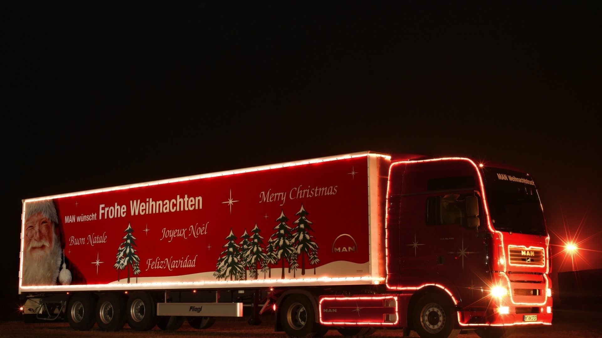 MAN Truck decorated with Christmas lights and greetings HD Wallpaper