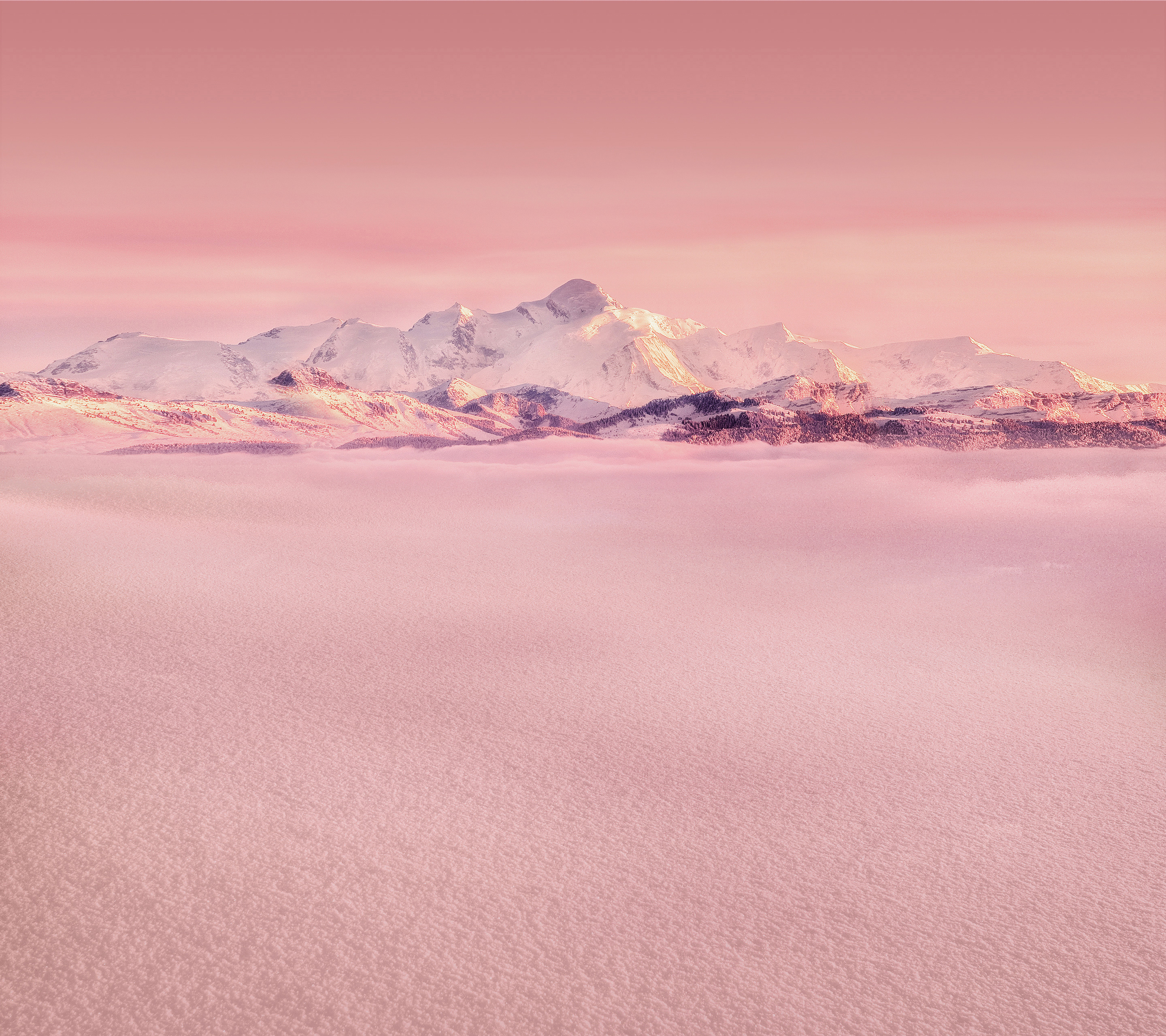 Snowy mountains above pink clouds and snow HD Wallpaper
