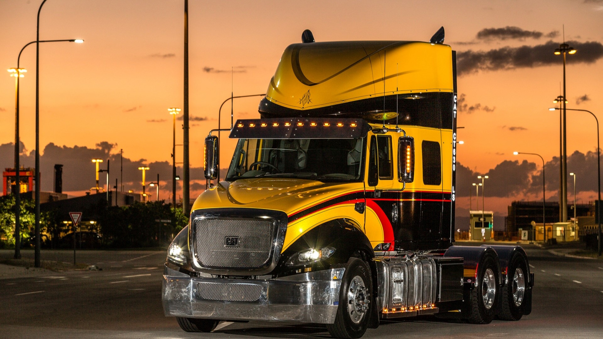 Caterpillar CT630 truck at sunset HD Wallpaper