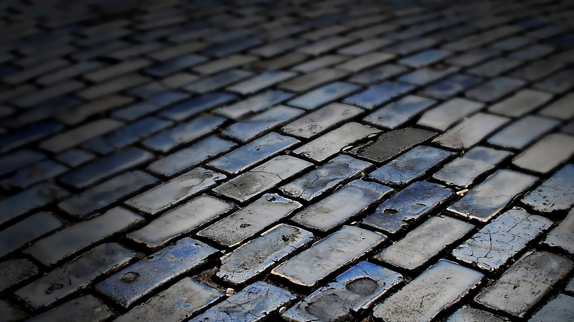 Cobblestone street with blue and gray bricks HD Wallpaper