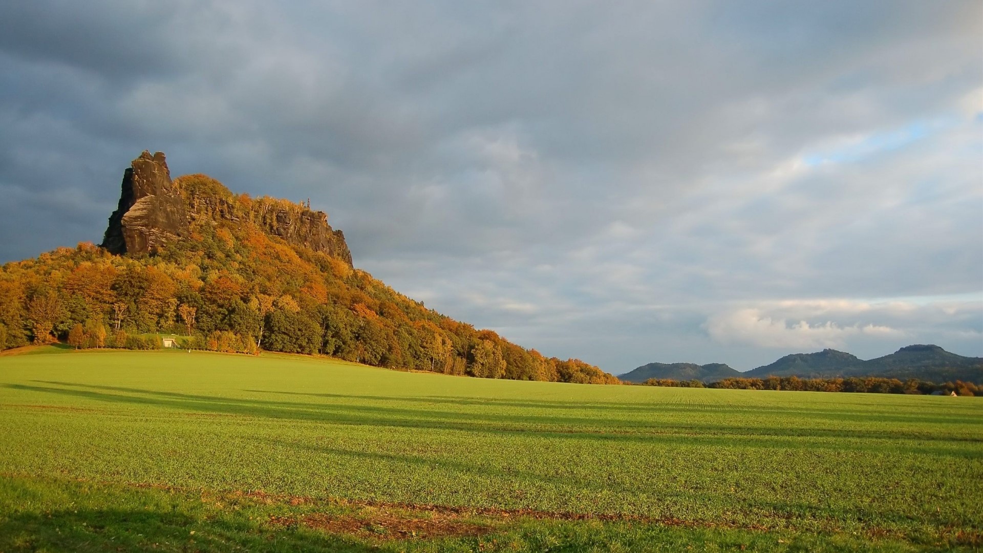 Autumn mountain landscape with green field HD Wallpaper
