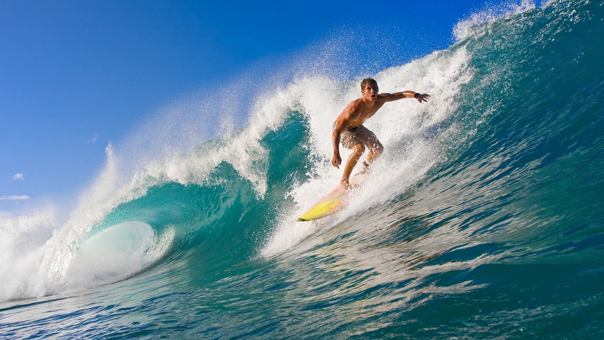 Man surfing a large wave HD Wallpaper