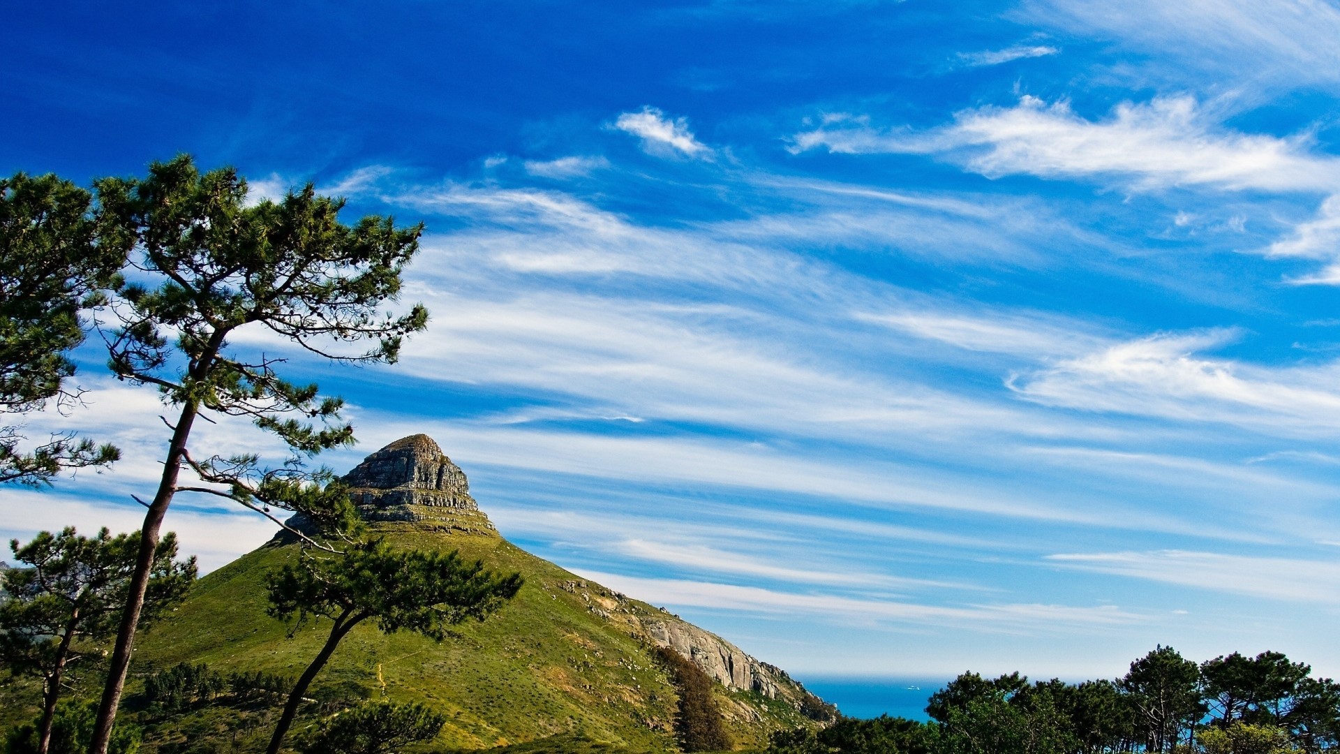 Lion's Head Mountain under a blue sky HD Wallpaper