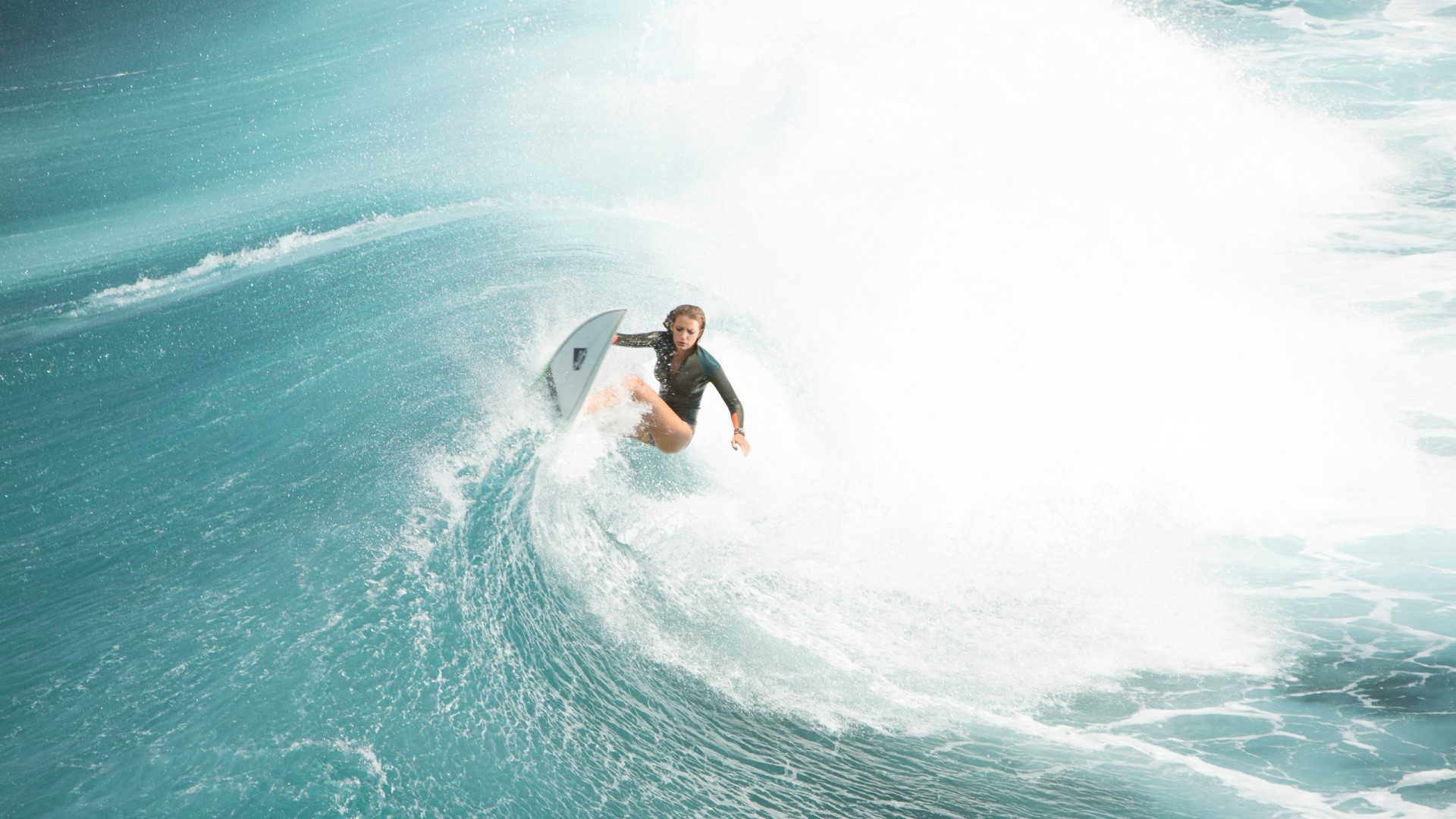Surfer riding a wave HD Wallpaper