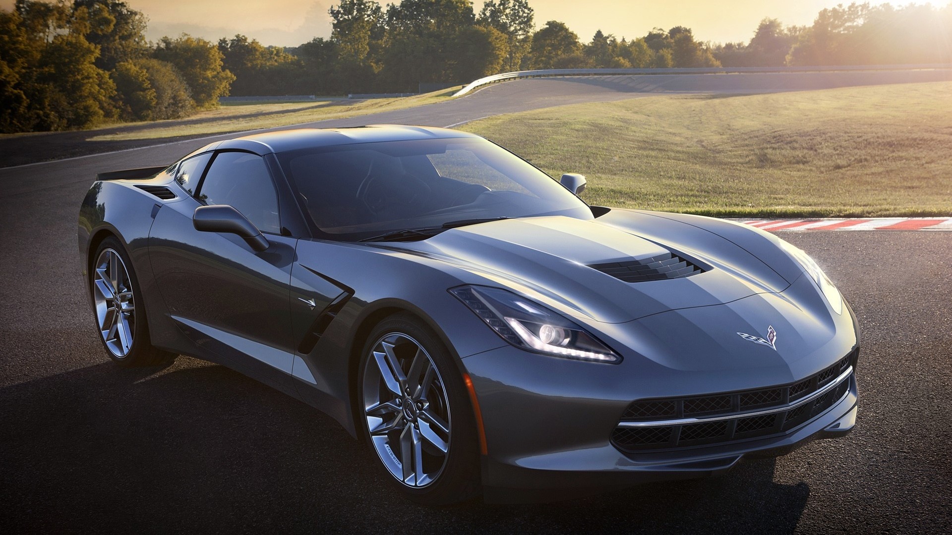 2013 Corvette Stingray on a Racetrack HD Wallpaper