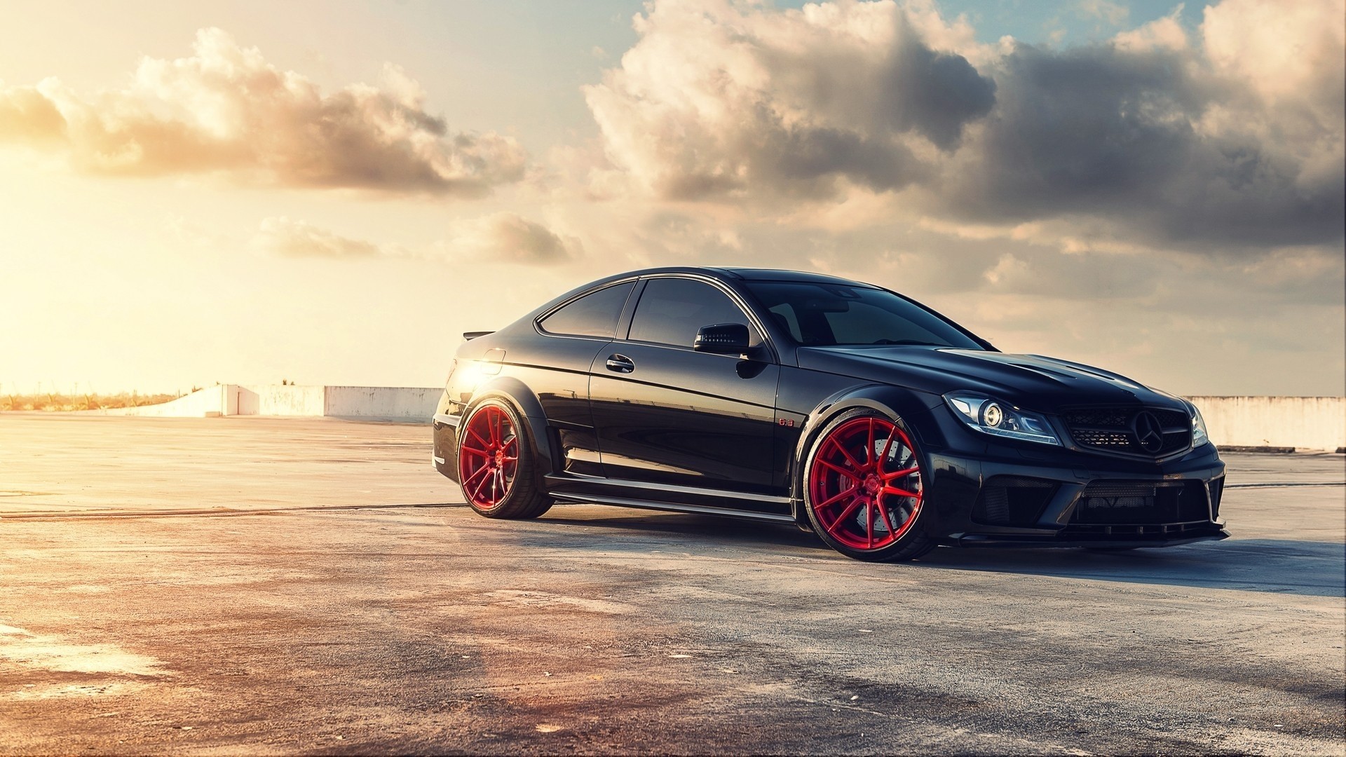 Black Mercedes-Benz C63 Coupe with Red Wheels HD Wallpaper