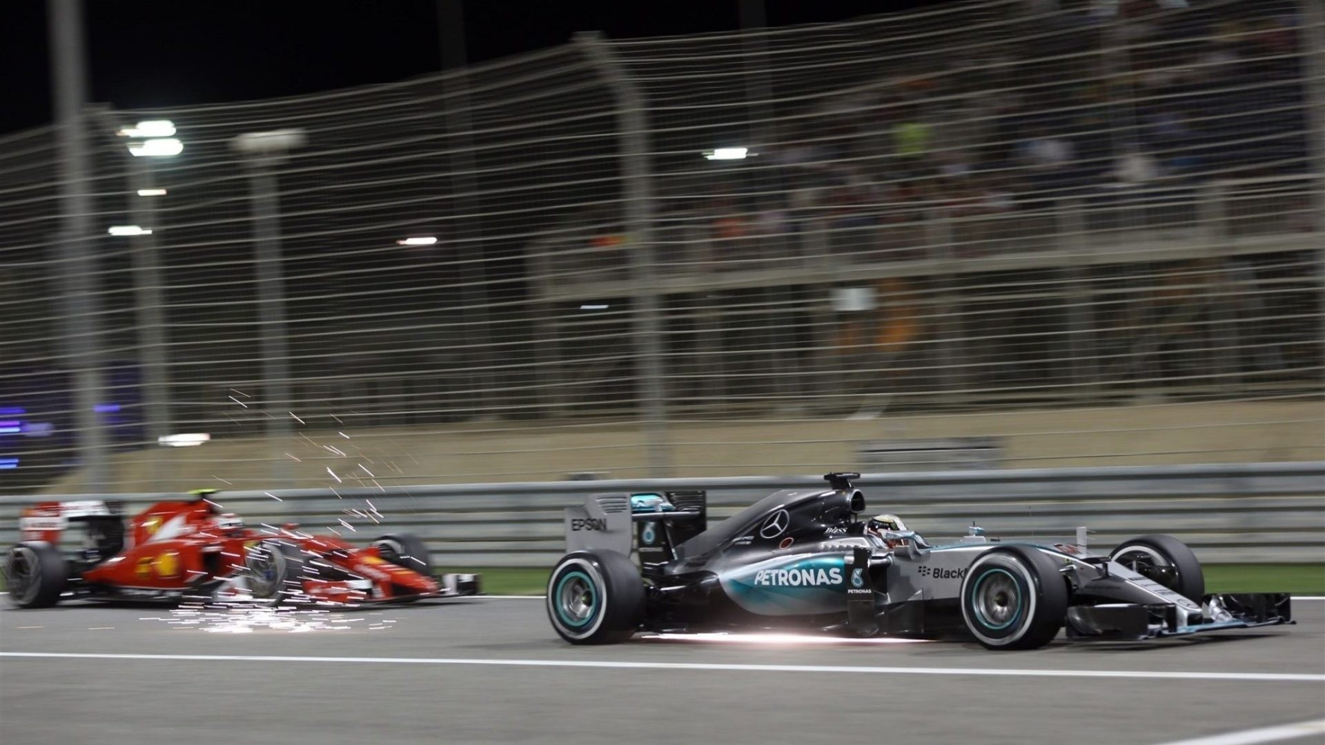 Formula 1 cars racing at night HD Wallpaper
